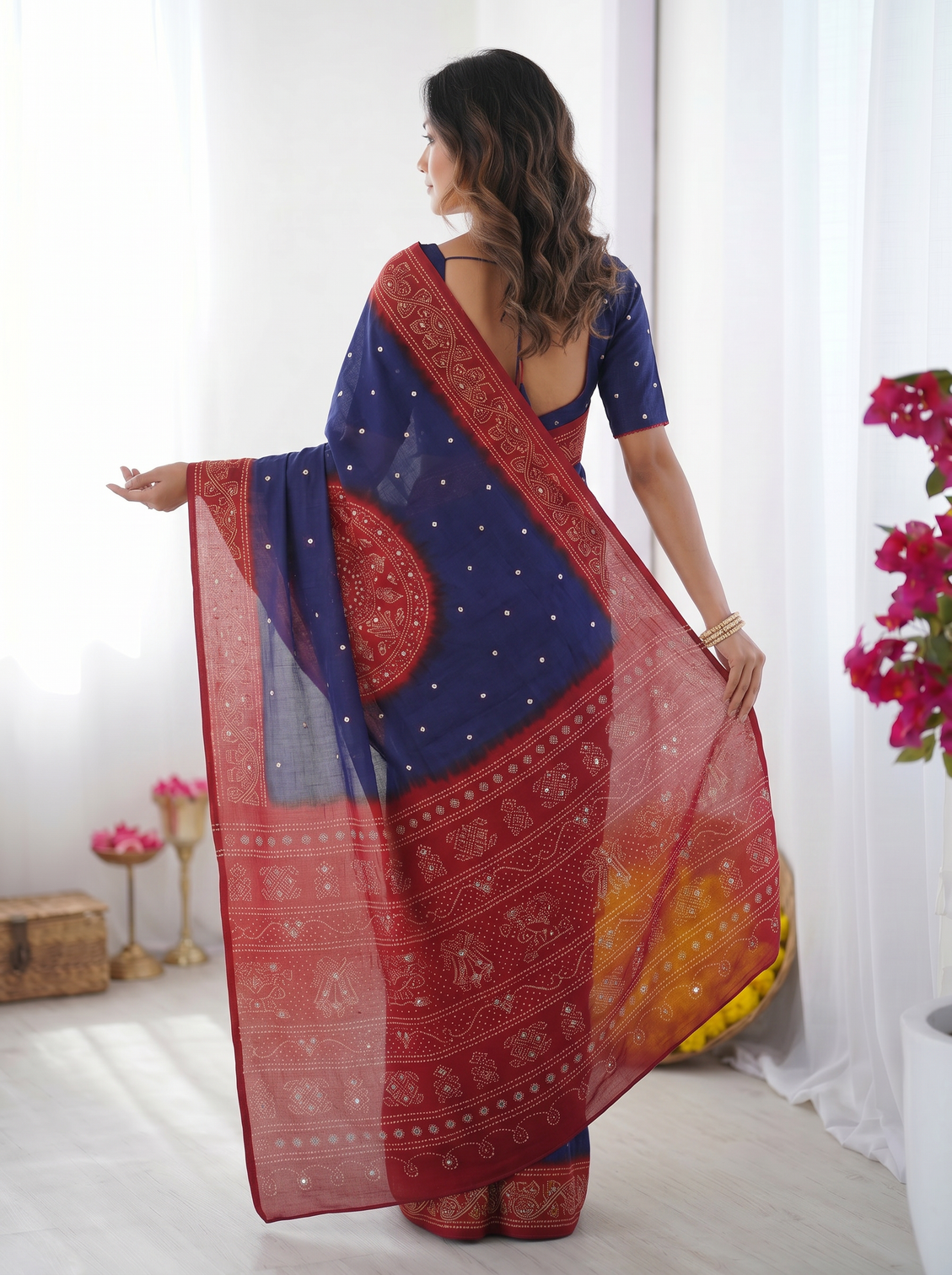 Royal blue crimson red bandhani inspired modal silk saree with traditional folk art pallu stone embellishments