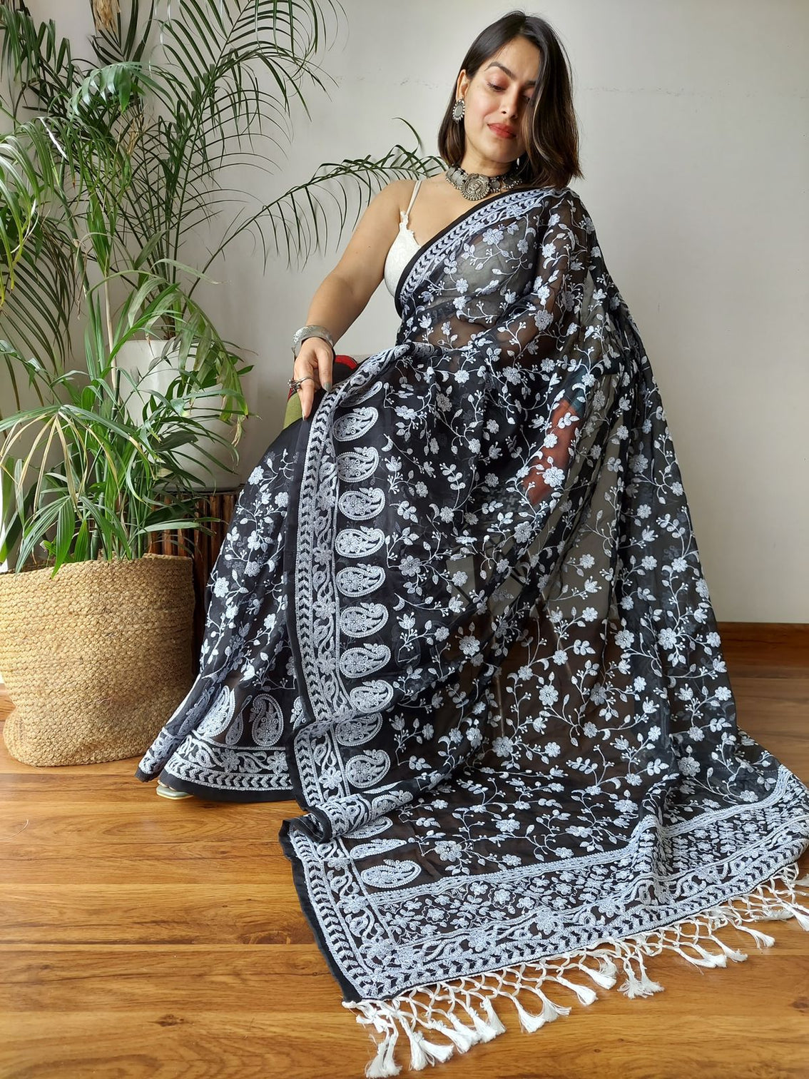 Black Viscose Organza Saree with Exquisite Chickenkari Embroidery – Paired with Elegant White Silk Blouse and Latkan