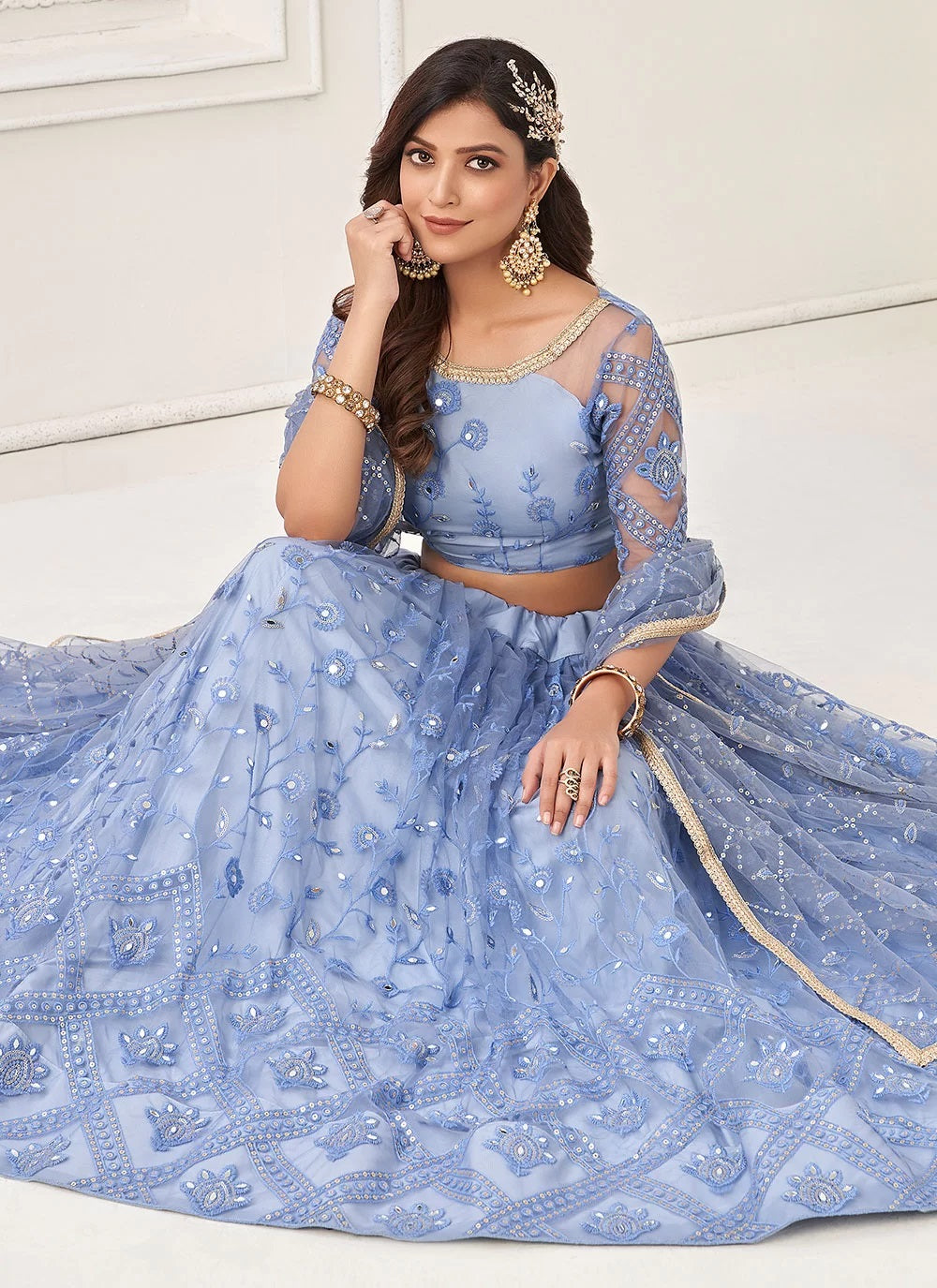 Blue net sequins embroidered lehenga for bridesmaid