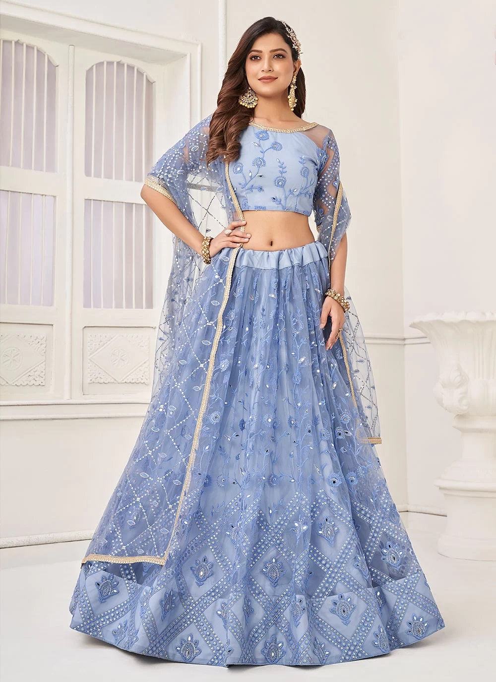 Blue net sequins embroidered lehenga for bridesmaid