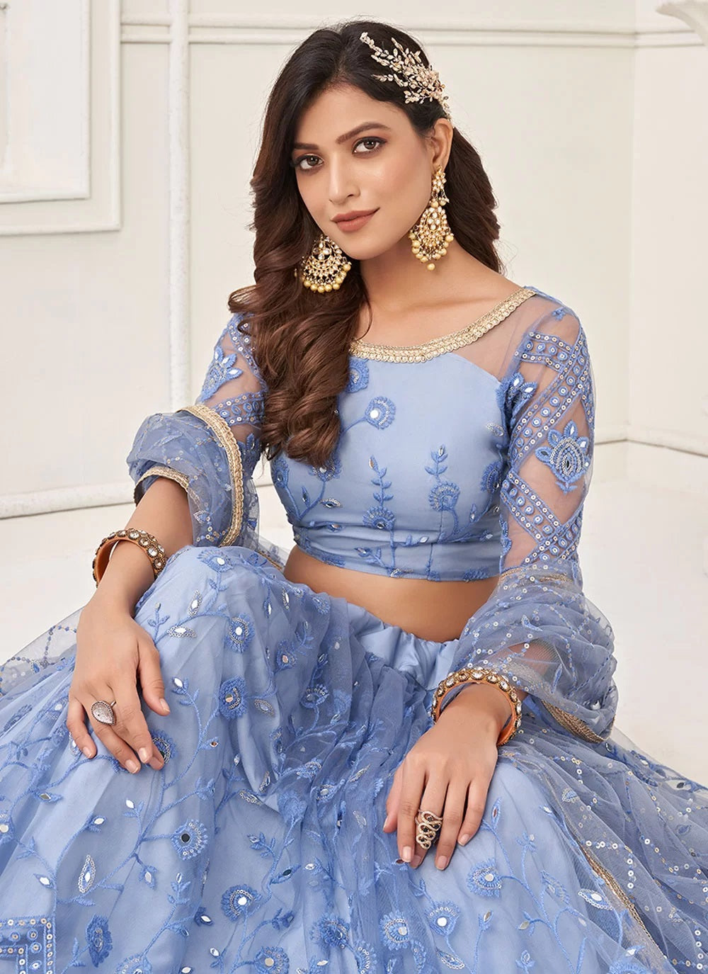 Blue net sequins embroidered lehenga for bridesmaid