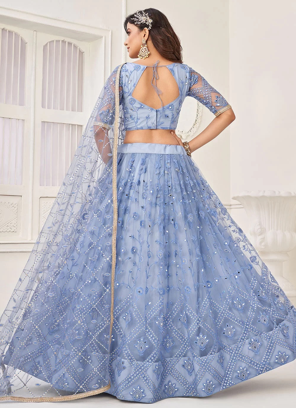 Blue net sequins embroidered lehenga for bridesmaid