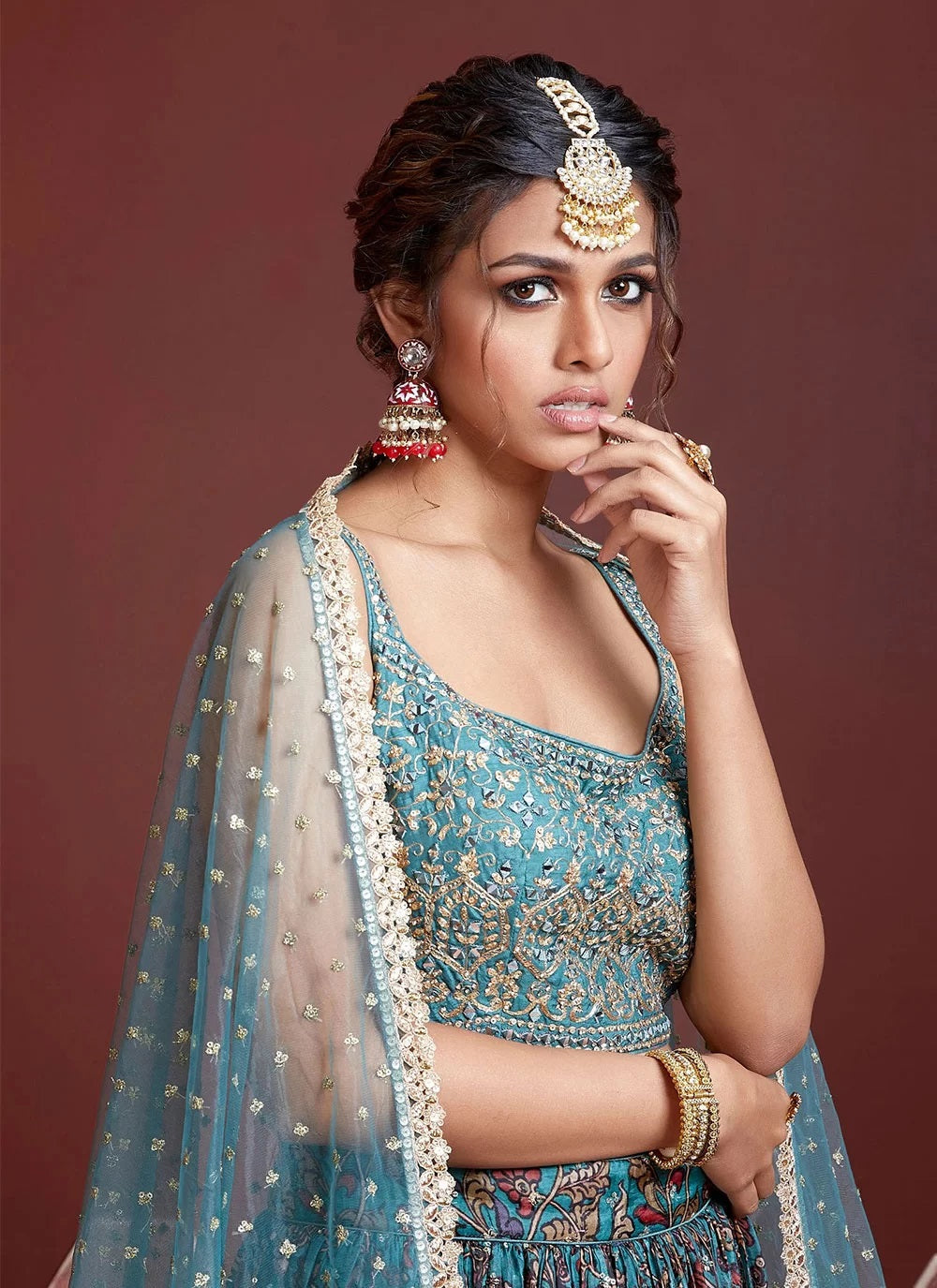 Blue red gold embroidered lehenga choli with threadwork dupatta