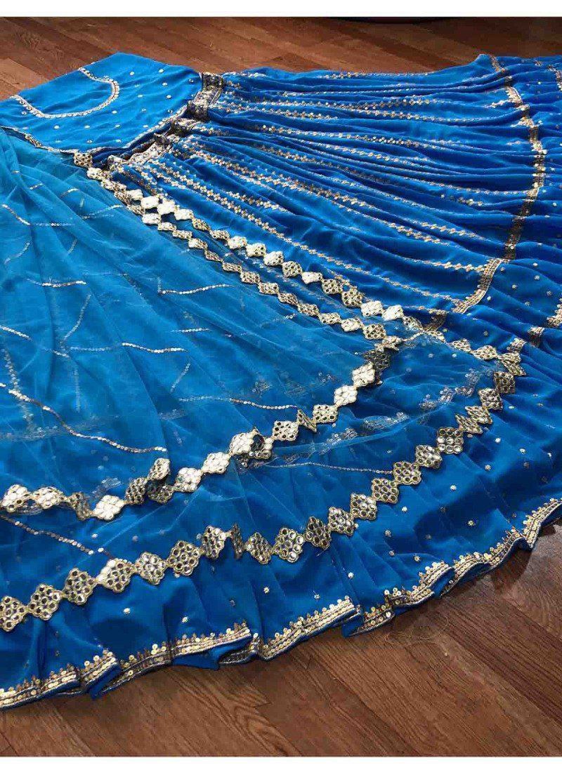 Blue Stunning Georgette Semi-Stitched Lehenga with Ruffle Border Sequins, Heavy Embroidered Faux Georgette Blouse, and Soft Net Dupatta