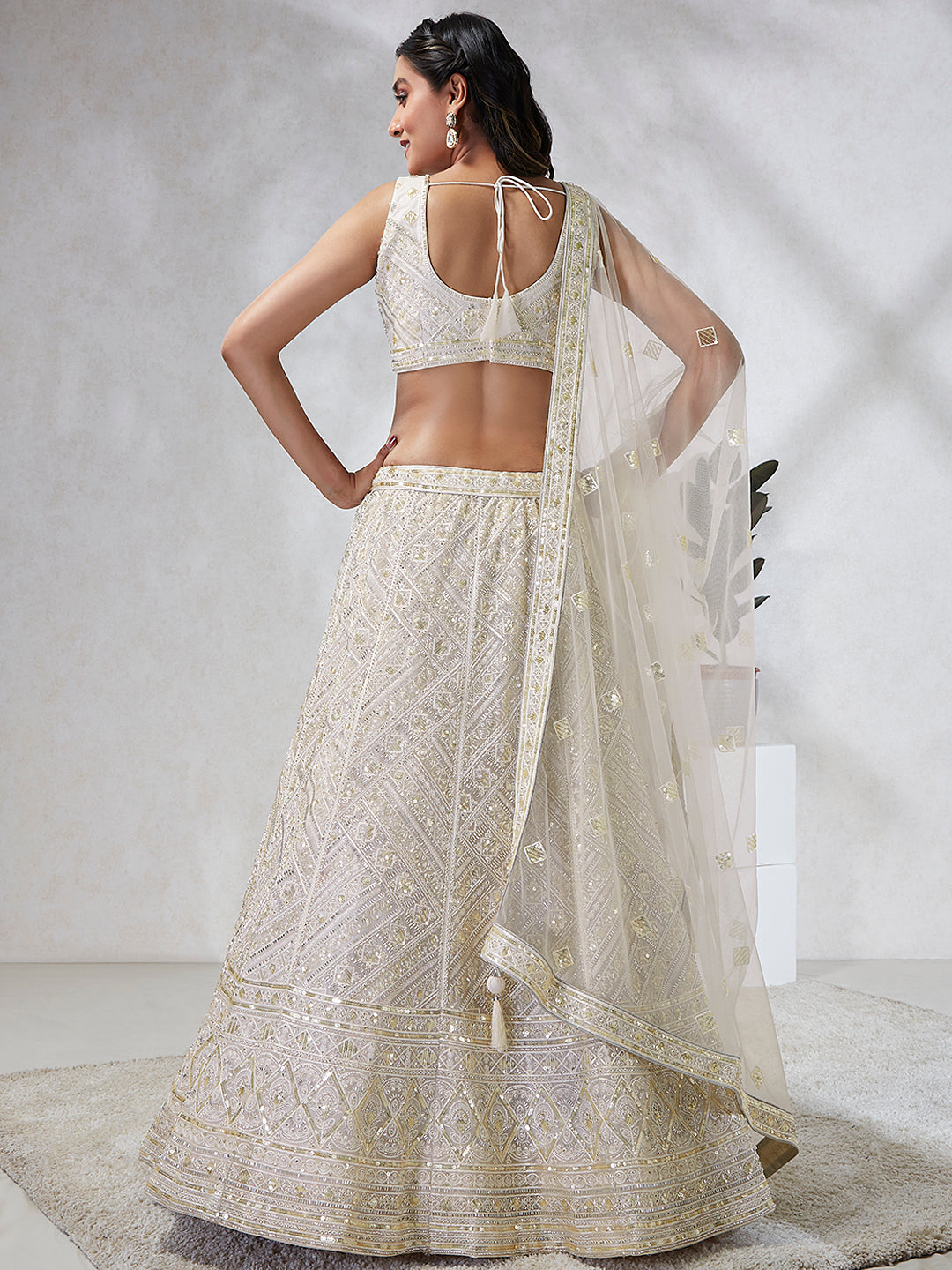 Breathtaking Cream Net Lehenga Choli Set with Cutdana, Sequin & Zarkan Work