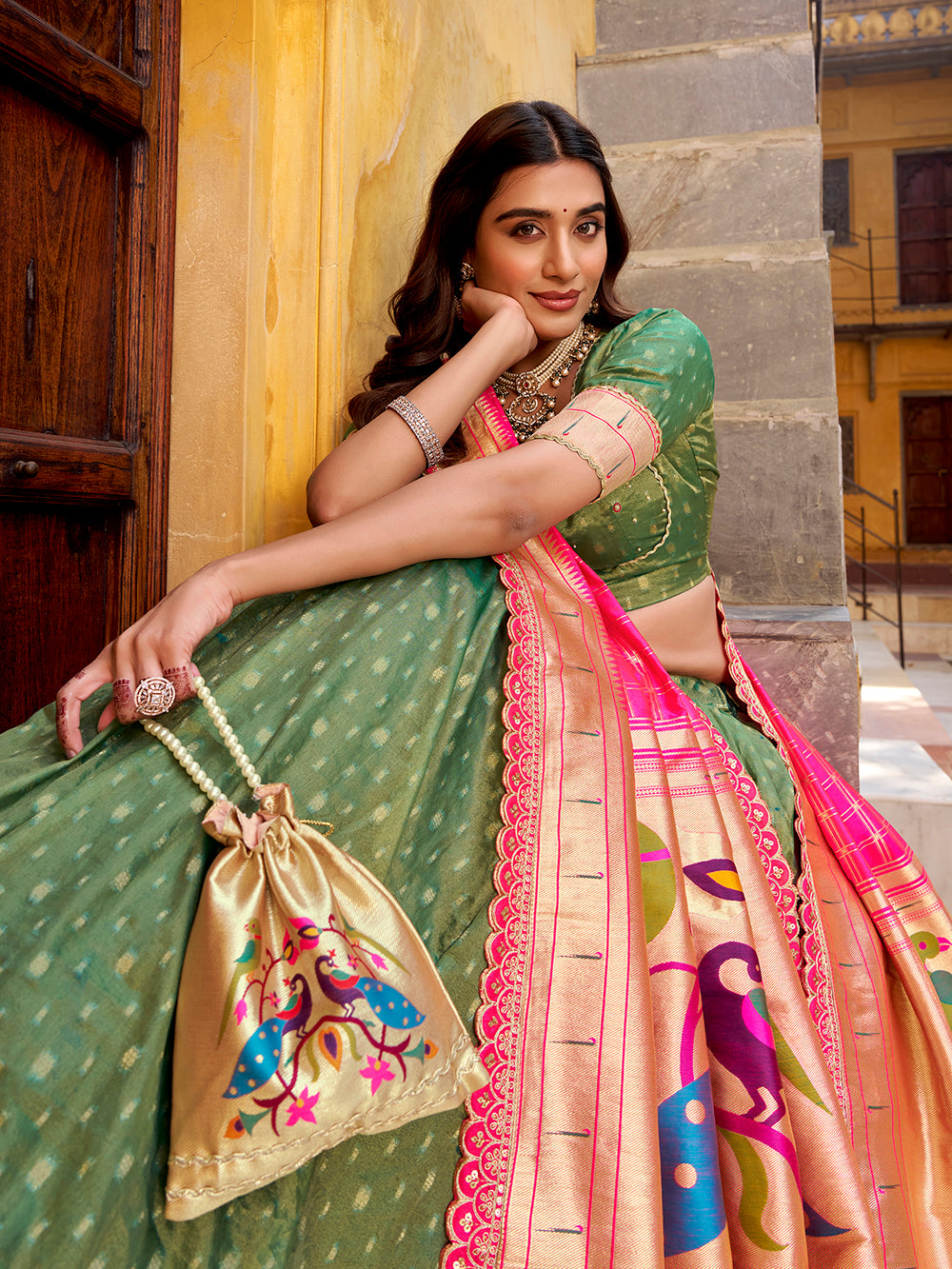 Green shimmer organza lehenga choli with zari weaving paithani dupatta purse