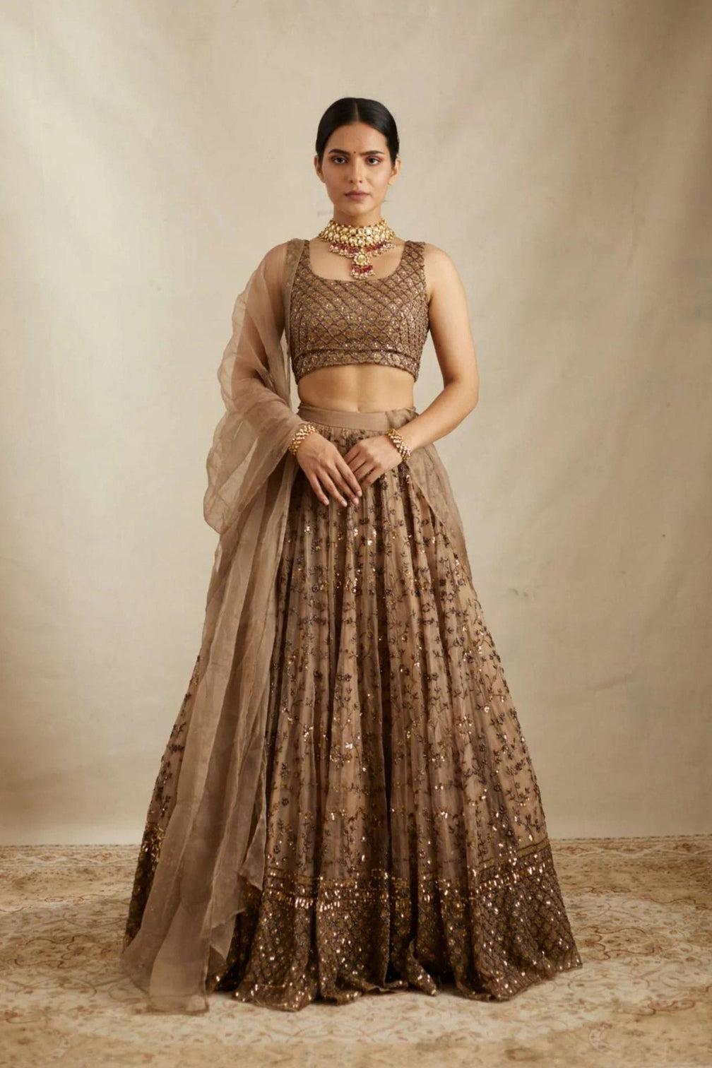 Brown Elegant Net Lehenga Set with Heavy Sequins & Jari Embroidery – Semi-Stitched Lehenga & Unstitched Choli