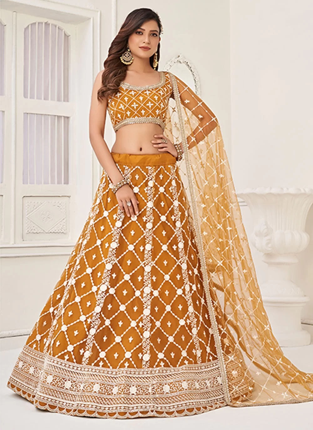 Brown net embroidered haldi wear lehenga choli