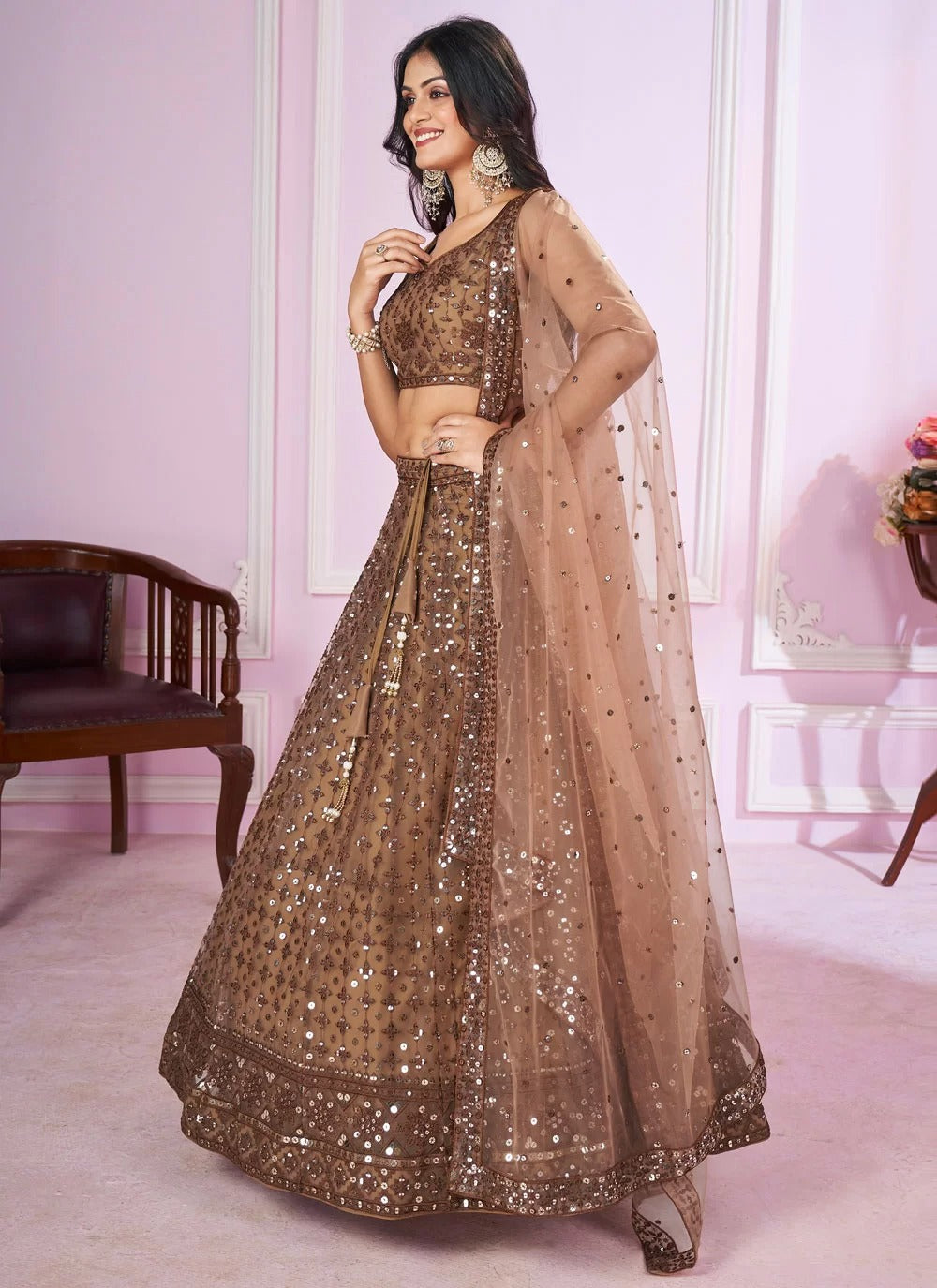 Traditional brown soft net lehenga choli with sequins thread embroidery