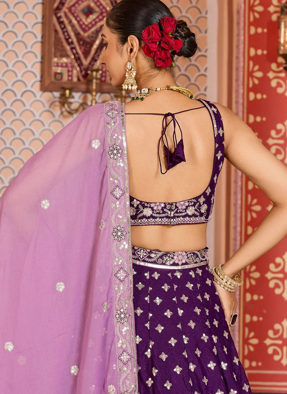 Opulent burgundy engagement lehenga in tissue silk with zari sequins embroidery