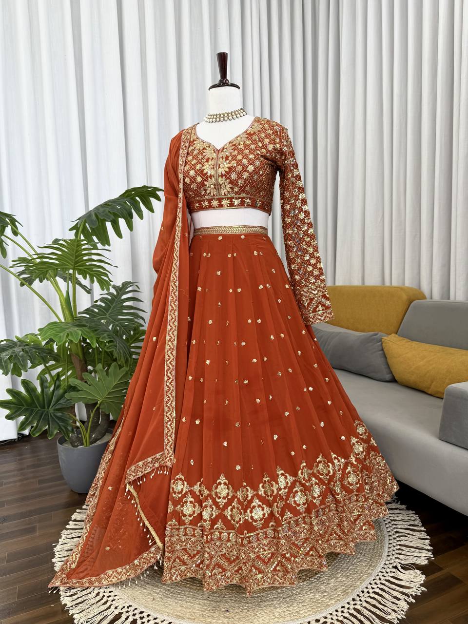 Burnt Orange Elegant Faux Georgette Embroidered Lehenga Choli with Dupatta