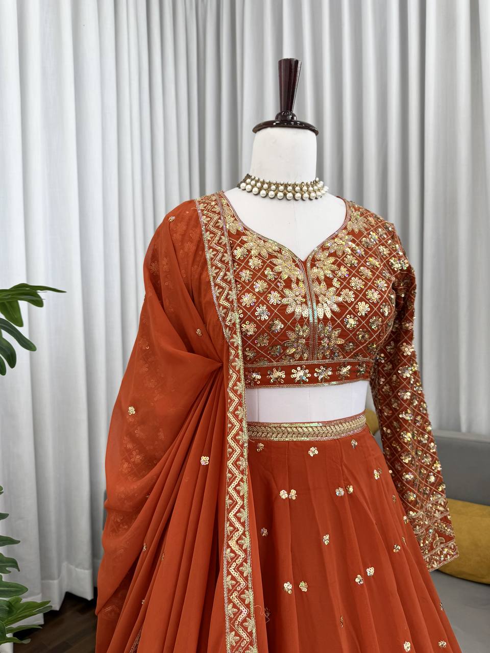 Burnt Orange Elegant Faux Georgette Embroidered Lehenga Choli with Dupatta