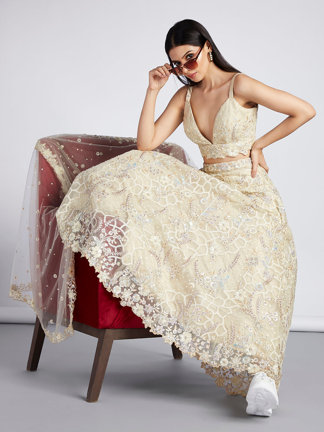 Captivating Cream Net Lehenga with Sequin & Zari Embellishments
