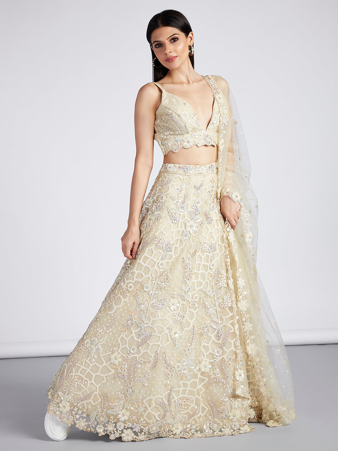 Captivating Cream Net Lehenga with Sequin & Zari Embellishments