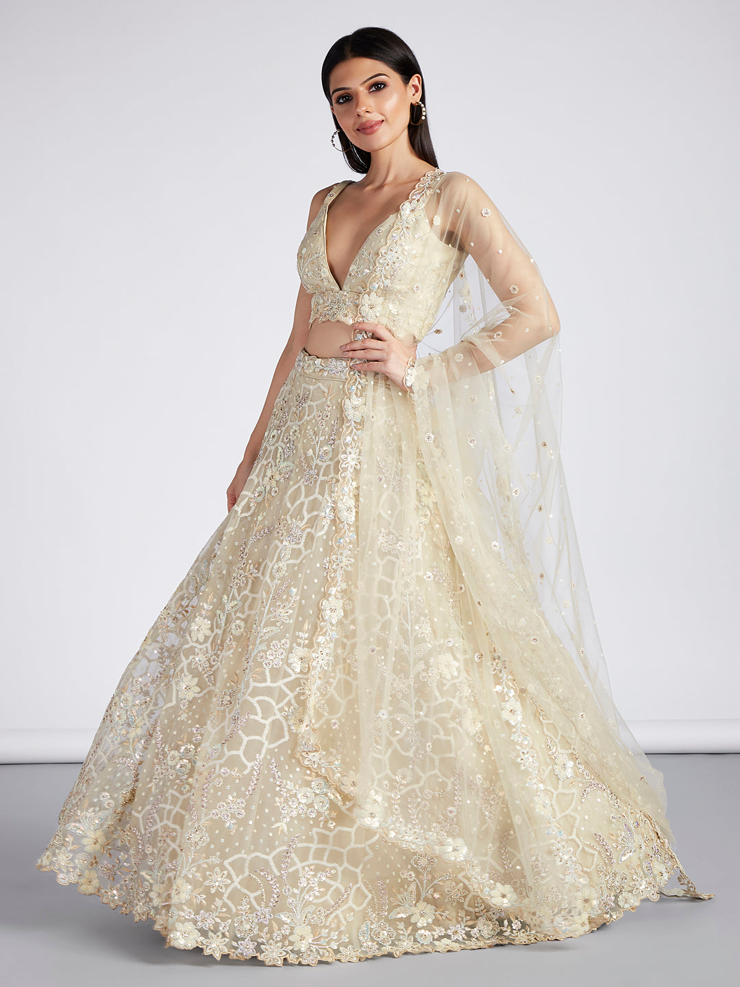 Captivating Cream Net Lehenga with Sequin & Zari Embellishments
