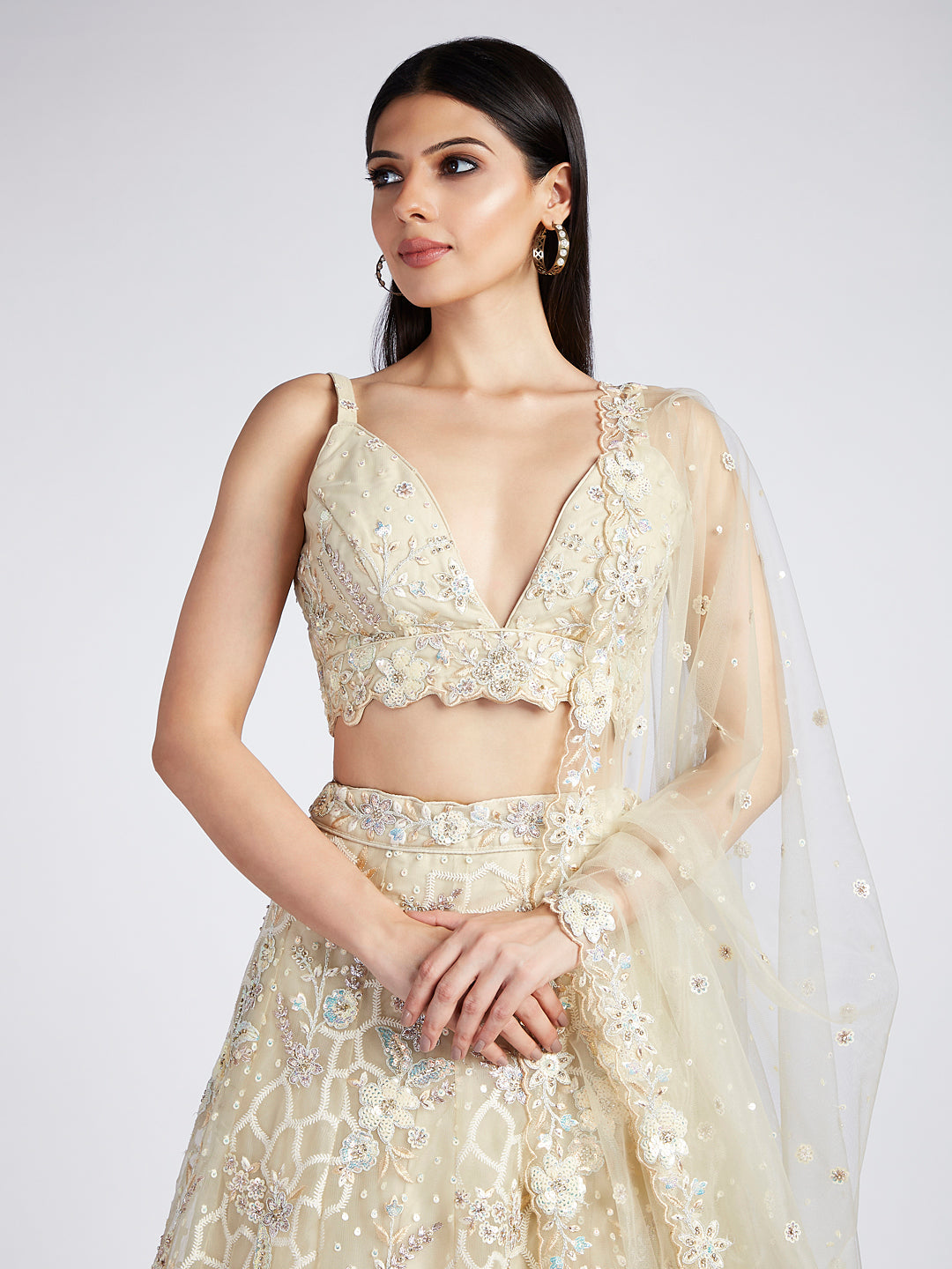 Captivating Cream Net Lehenga with Sequin & Zari Embellishments