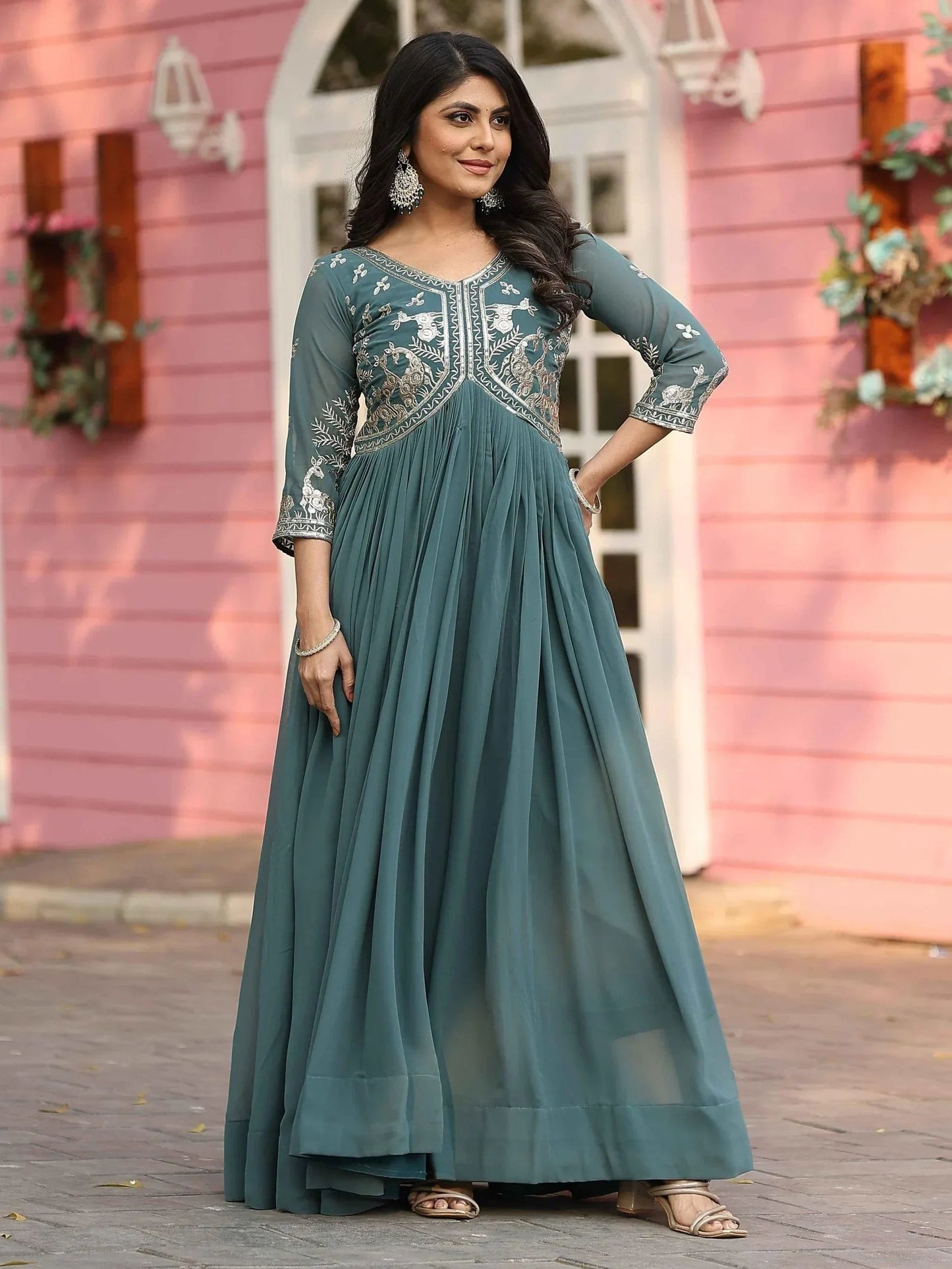 Captivating Teal Green Sequins Work Georgette Festive Wear Gown