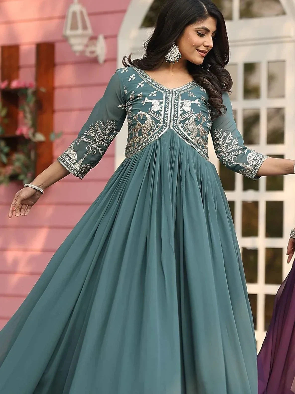 Captivating Teal Green Sequins Work Georgette Festive Wear Gown