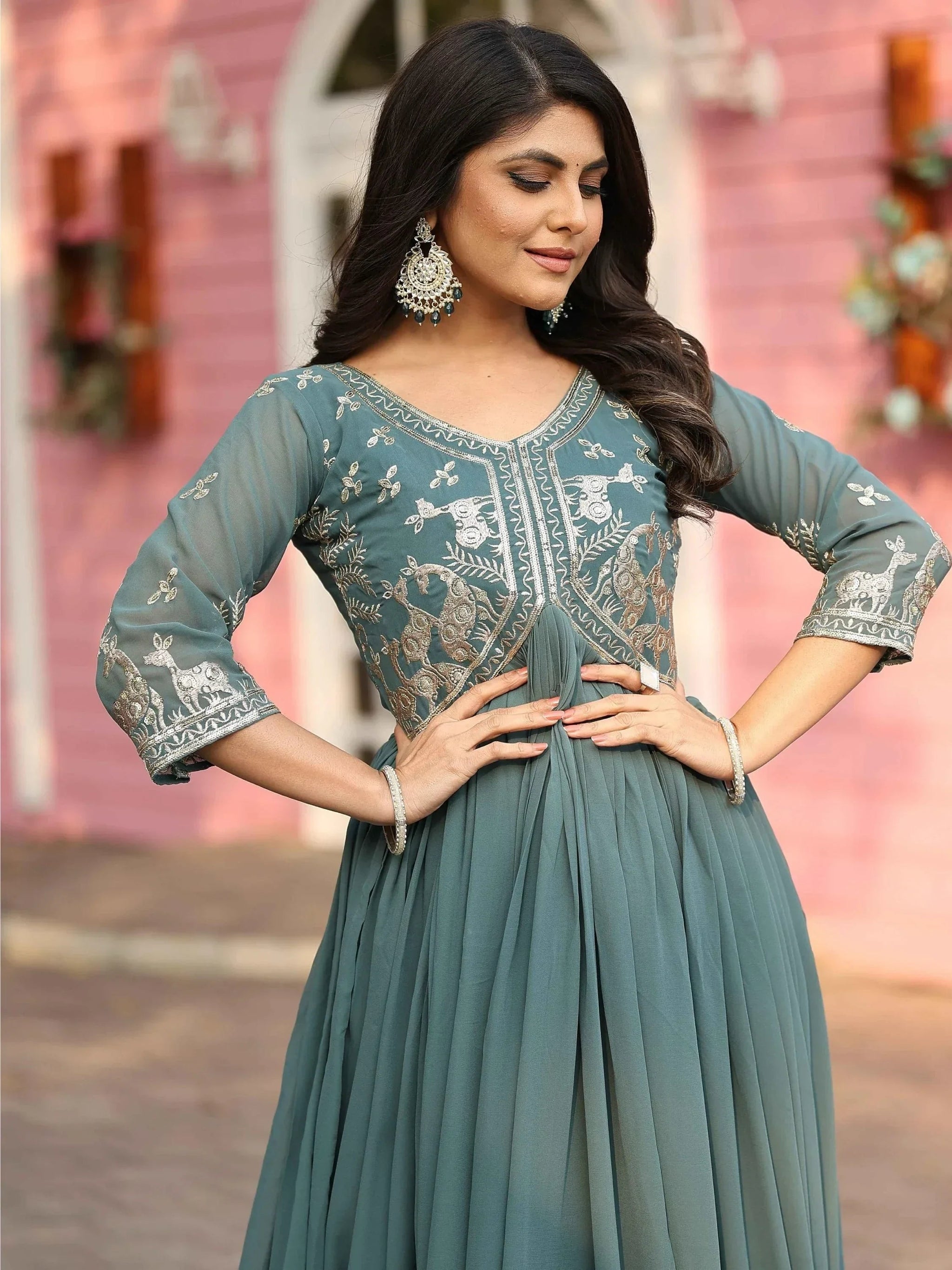 Captivating Teal Green Sequins Work Georgette Festive Wear Gown