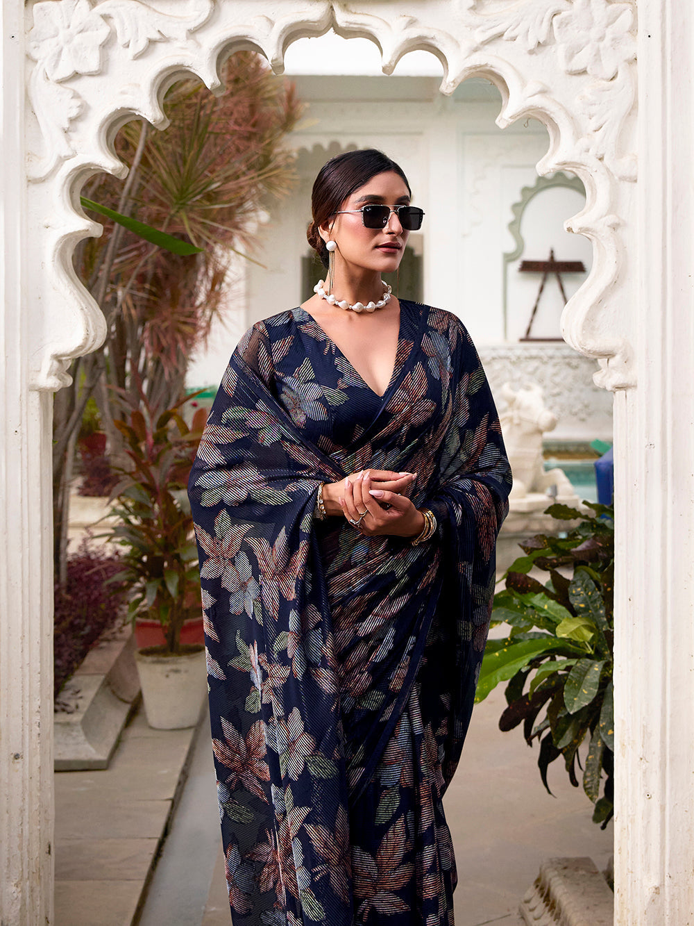 Navy blue lurex brasso saree with floral viscose work matching blouse