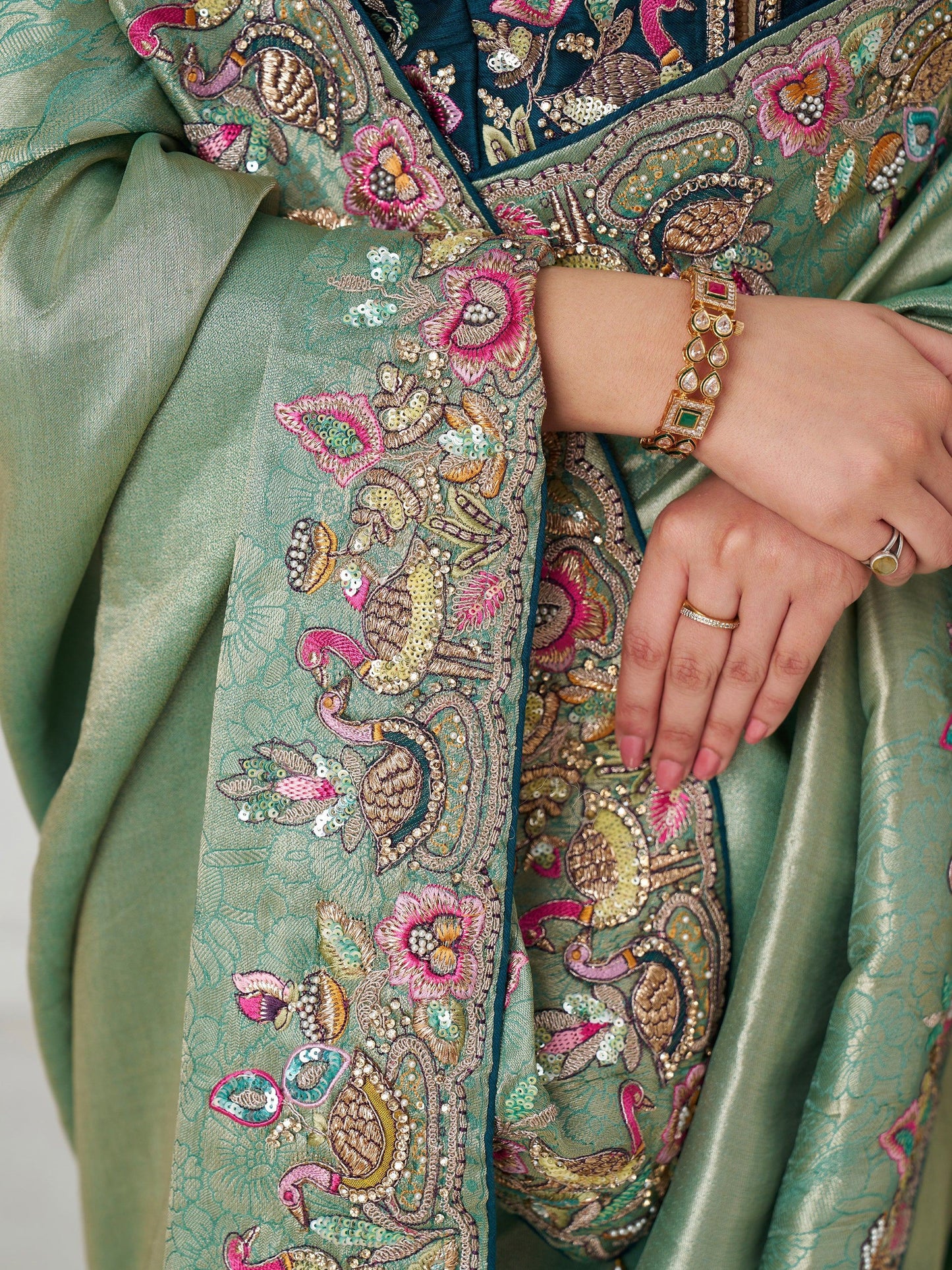 Charming Teal Green Border Work Dola Silk Engagement Wear Saree