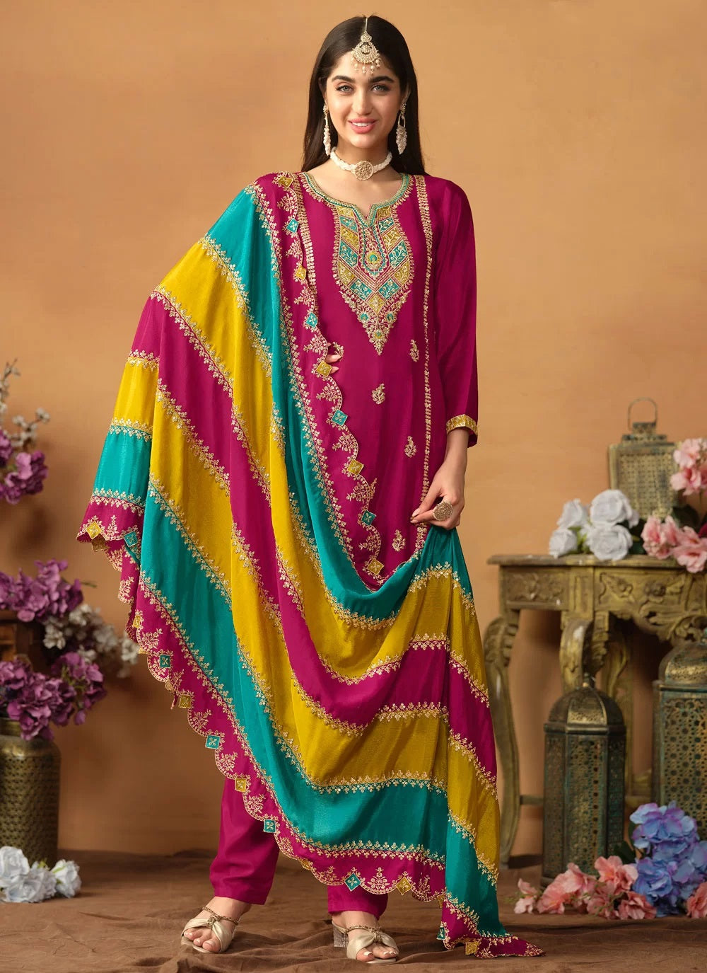 Chinon silk pant style pakistani embroidered suit in rani