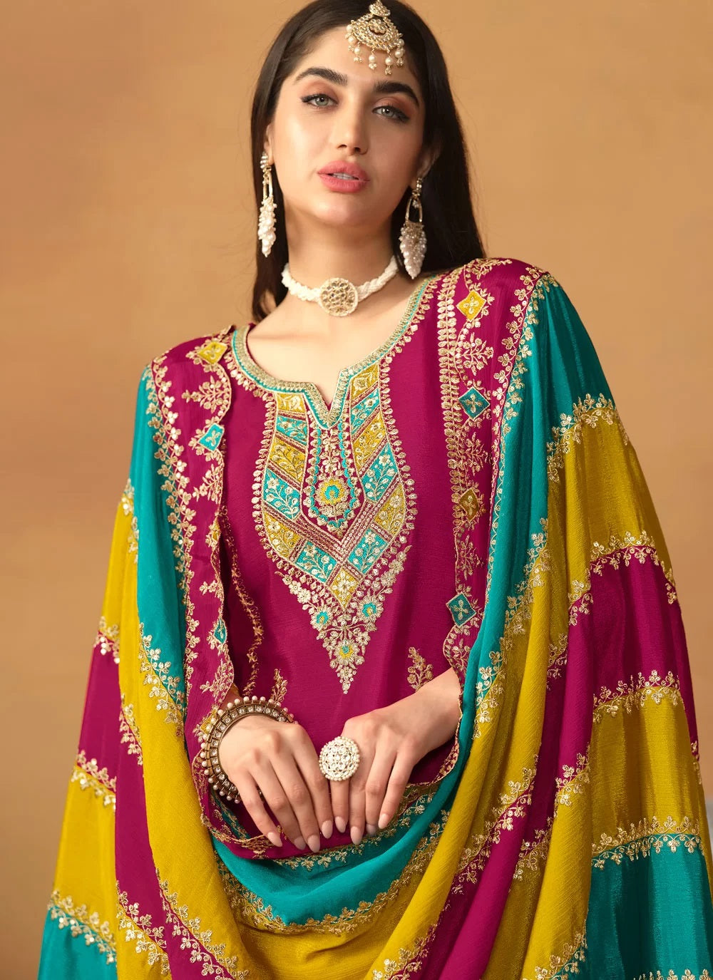 Chinon silk pant style pakistani embroidered suit in rani
