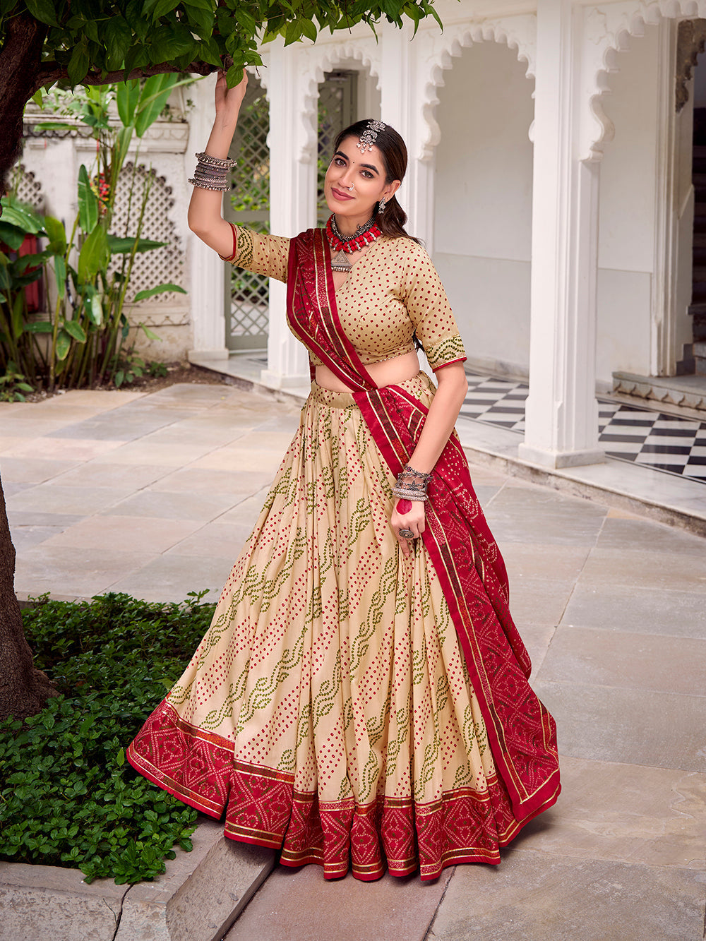 Off white tasar silk bandhej print lehenga choli with gotta patti lace work 4 meter flair