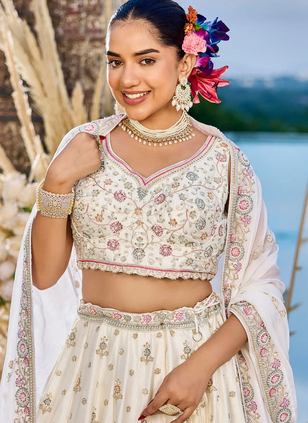 Cream silk wedding guest lehenga with sequins coding embroidery