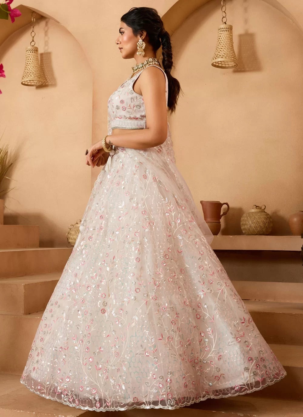 Cream net embroidered bridesmaid wedding lehenga choli with dupatta