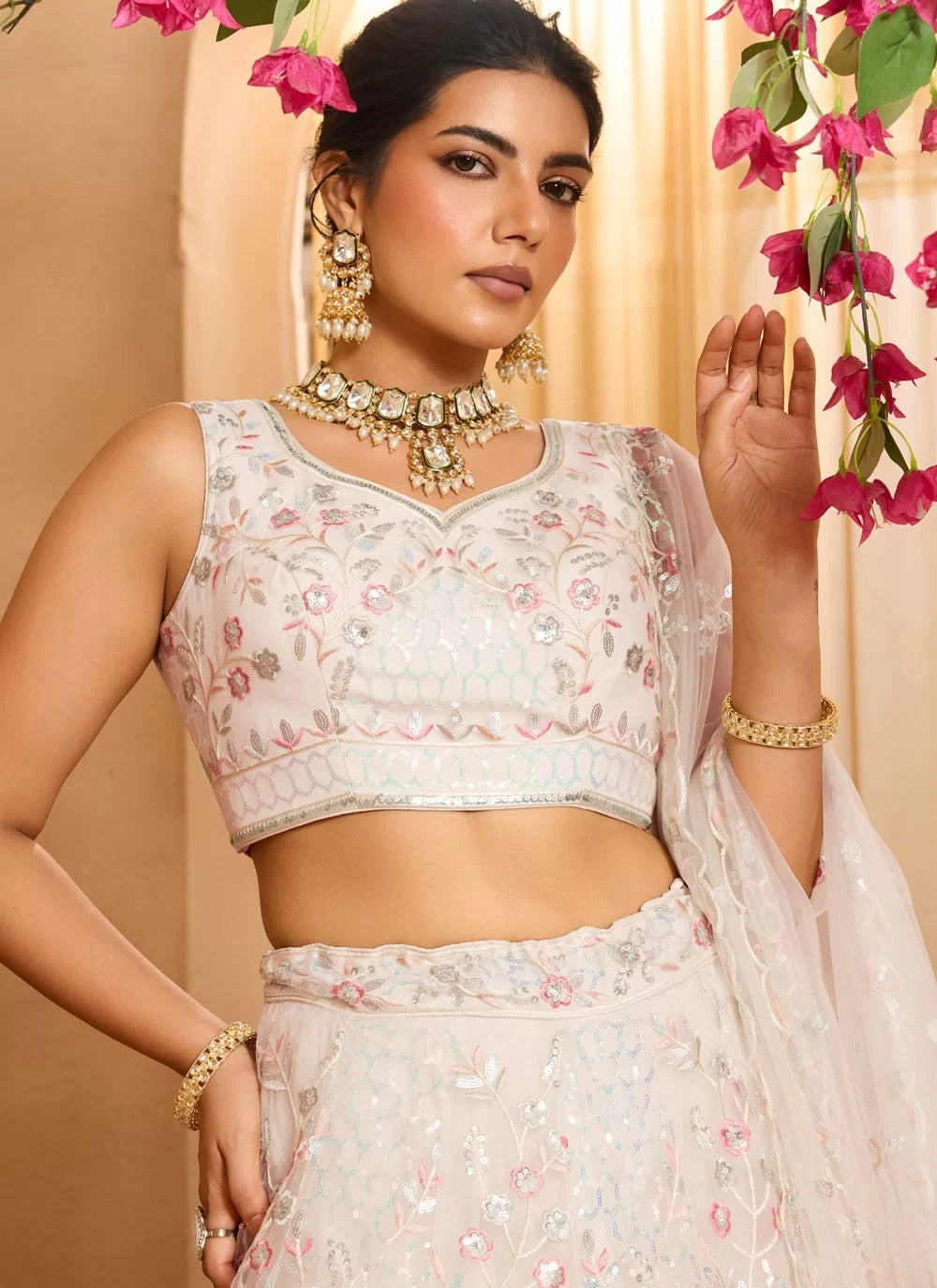 Cream net embroidered bridesmaid wedding lehenga choli with dupatta