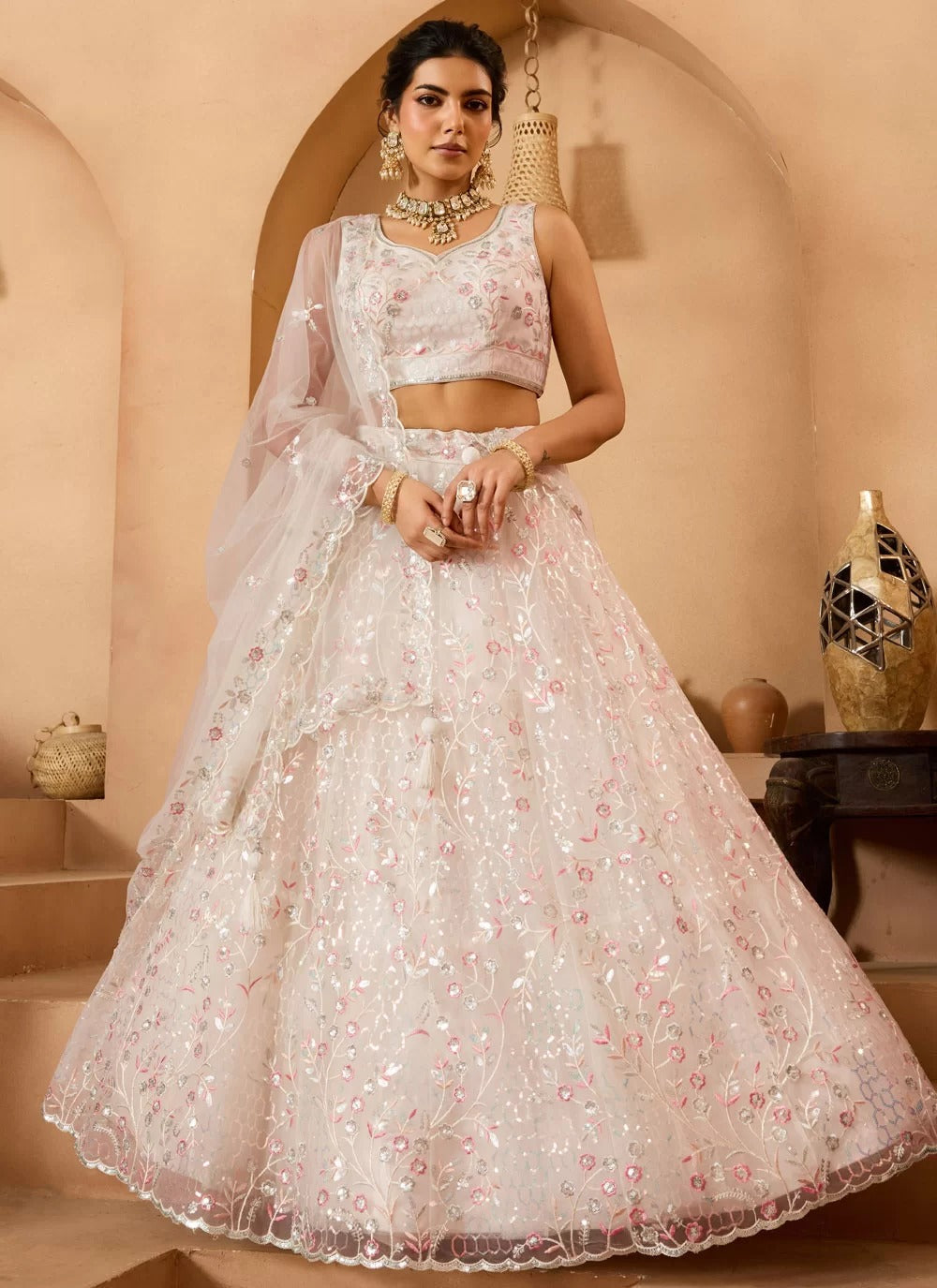 Cream net embroidered bridesmaid wedding lehenga choli with dupatta