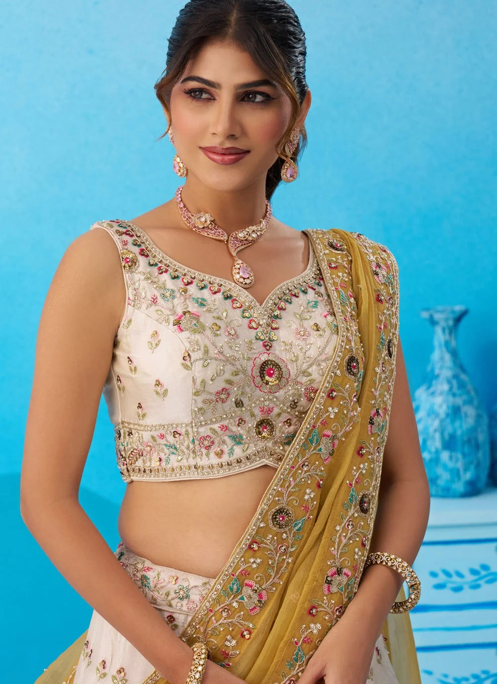 Cream patch work lehenga for women with mustard tissue dupatta