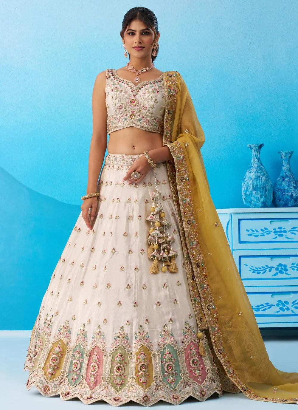 Cream patch work lehenga for women with mustard tissue dupatta
