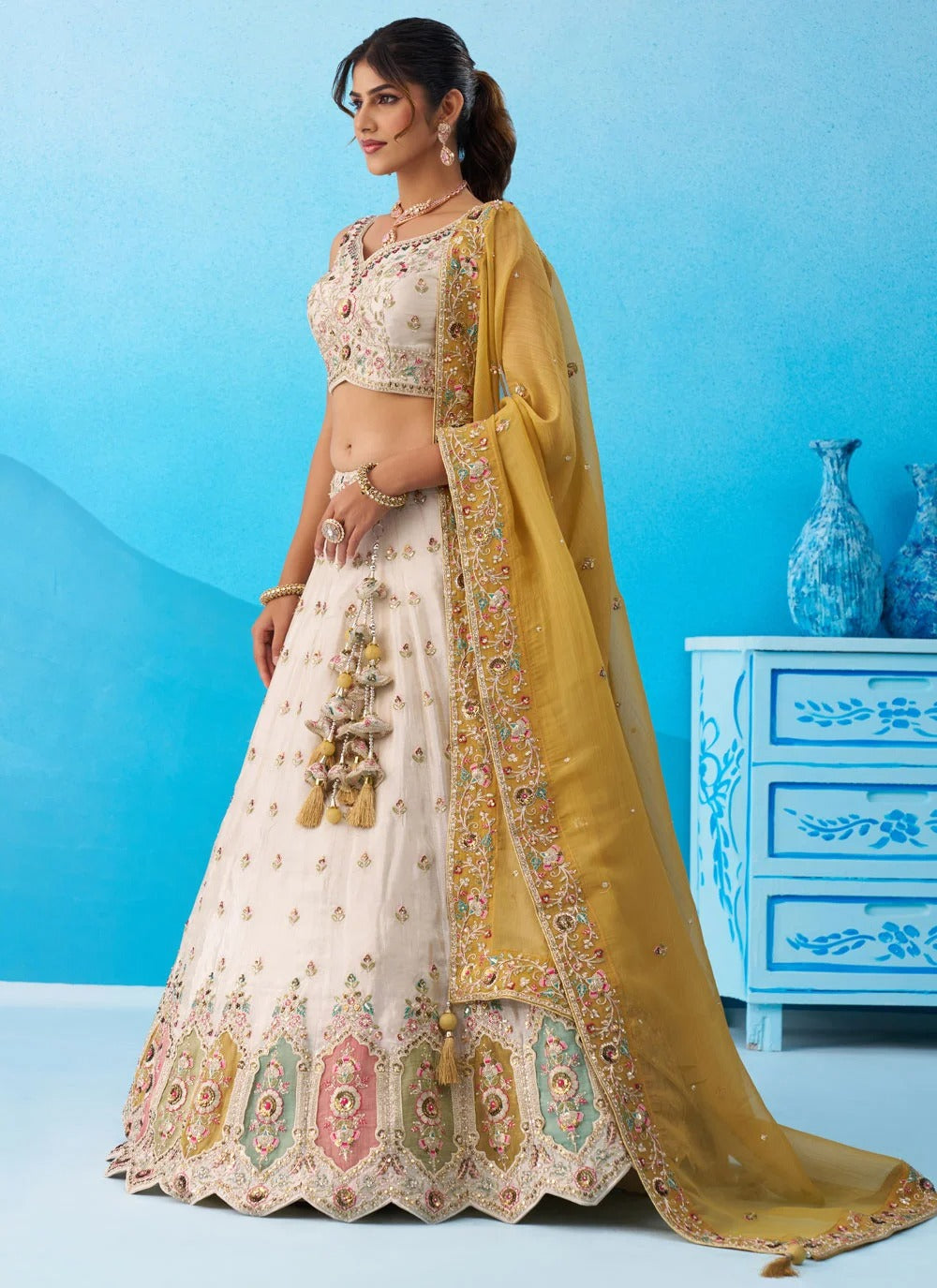 Cream patch work lehenga for women with mustard tissue dupatta