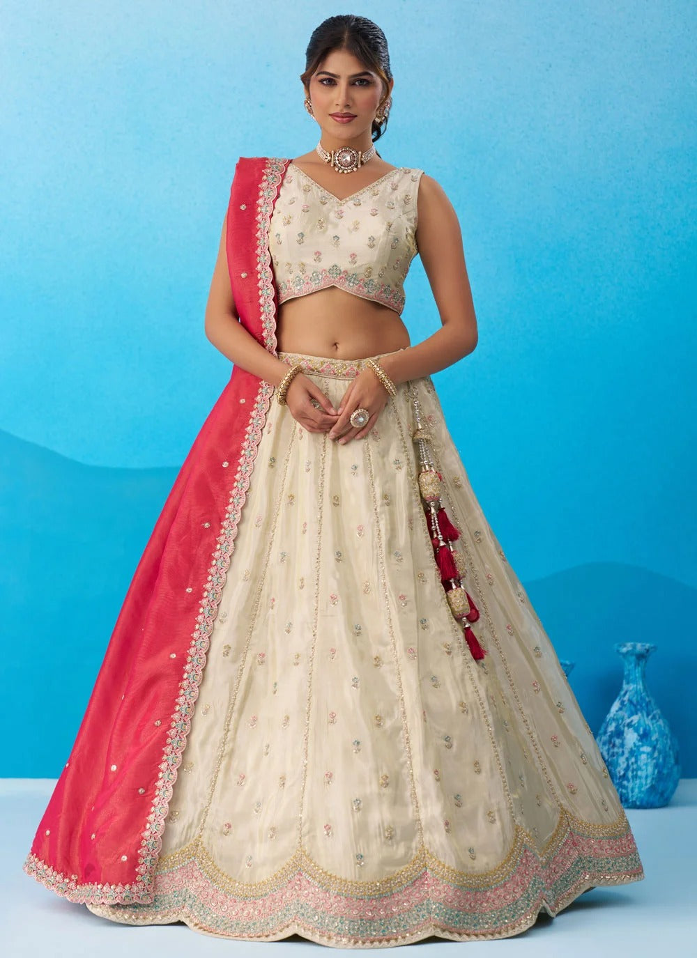 Cream tissue embroidered lehenga with pink dupatta