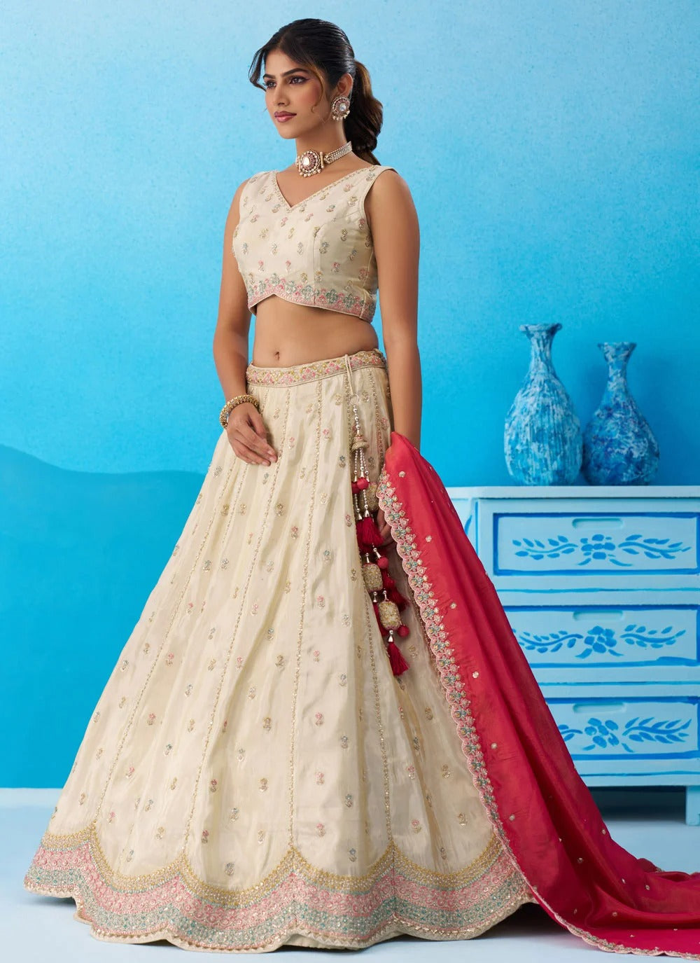 Cream tissue embroidered lehenga with pink dupatta