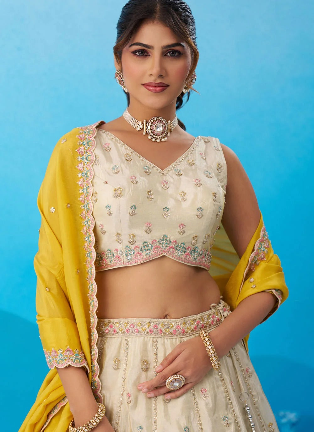 Cream and mustard tissue embroidered lehenga set with sequins work
