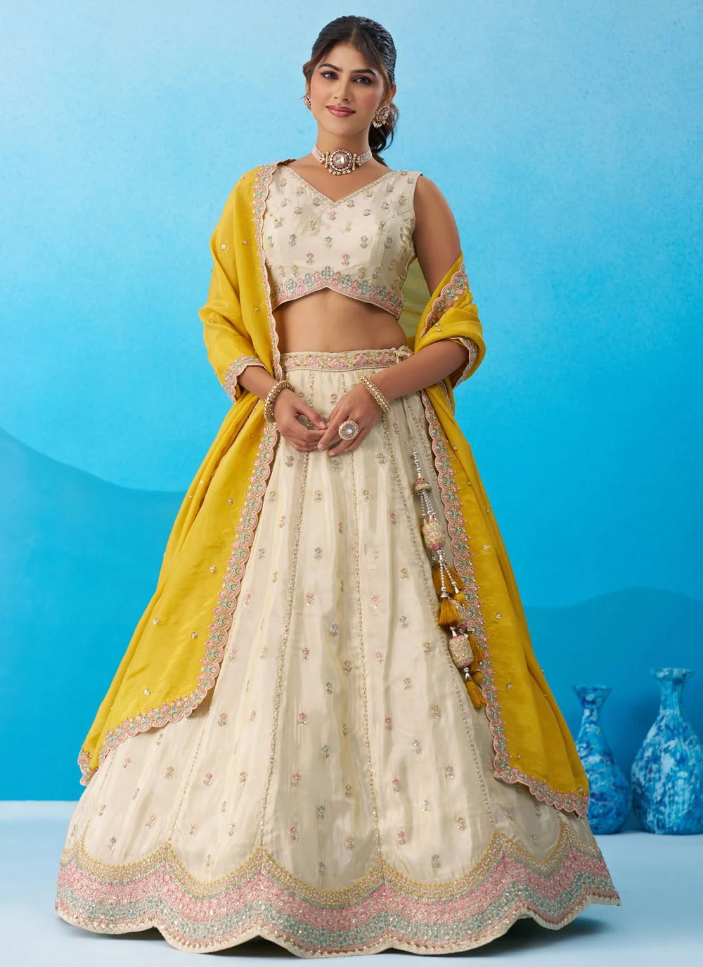 Cream and mustard tissue embroidered lehenga set with sequins work