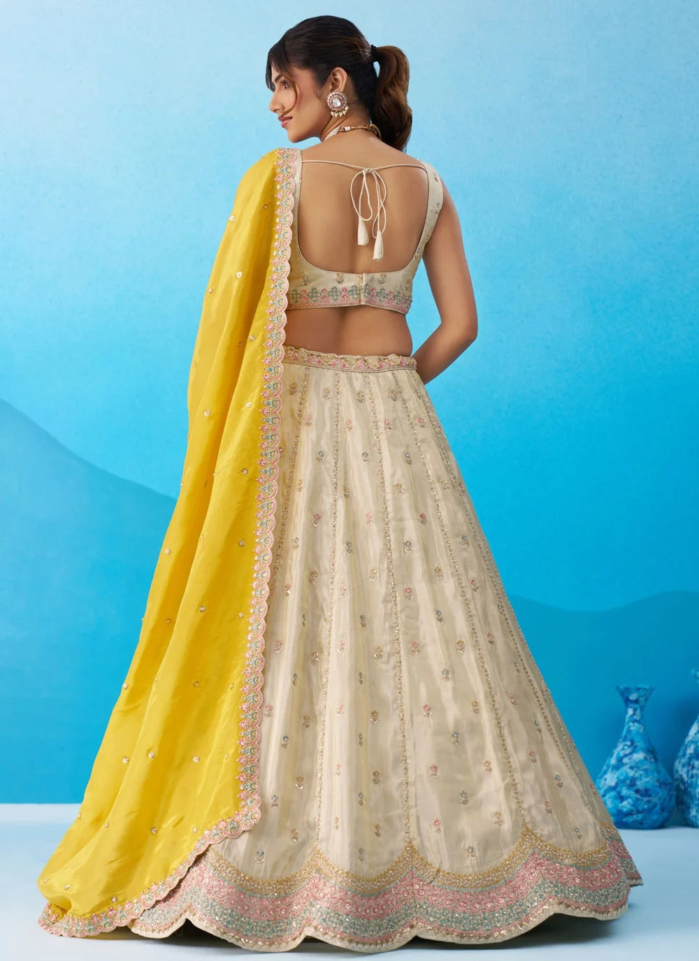 Cream and mustard tissue embroidered lehenga set with sequins work