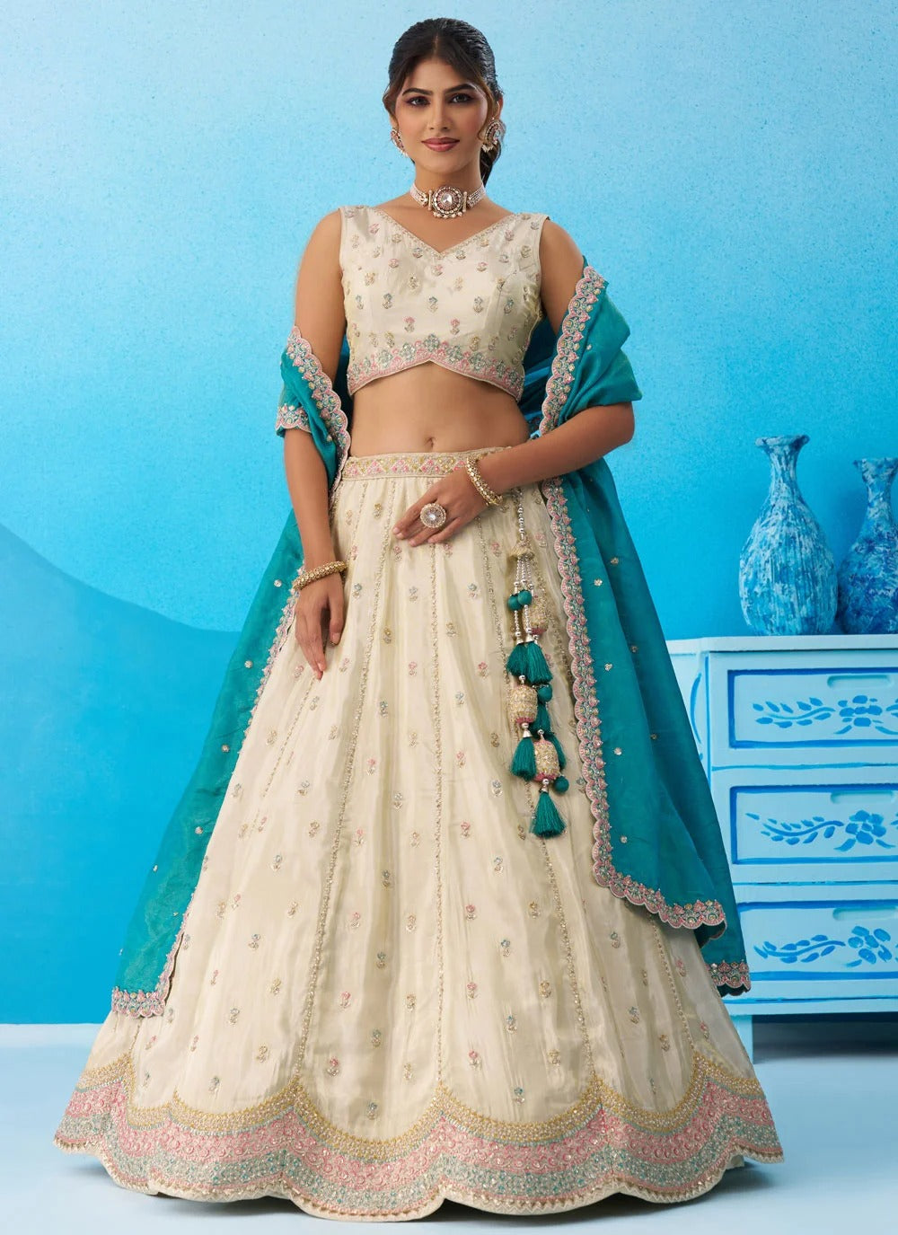 Cream wedding lehenga for women with rama tissue dupatta