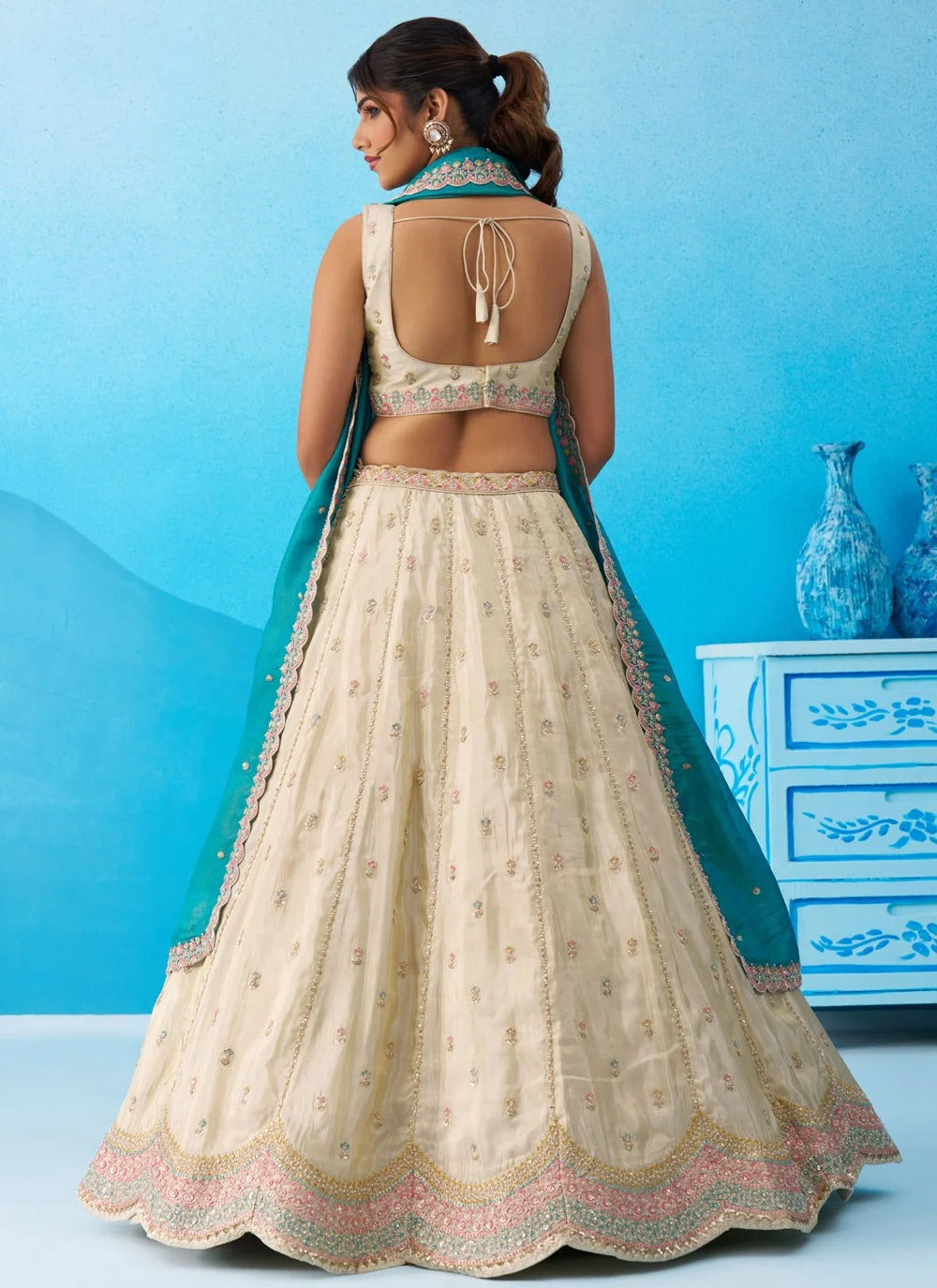 Cream wedding lehenga for women with rama tissue dupatta