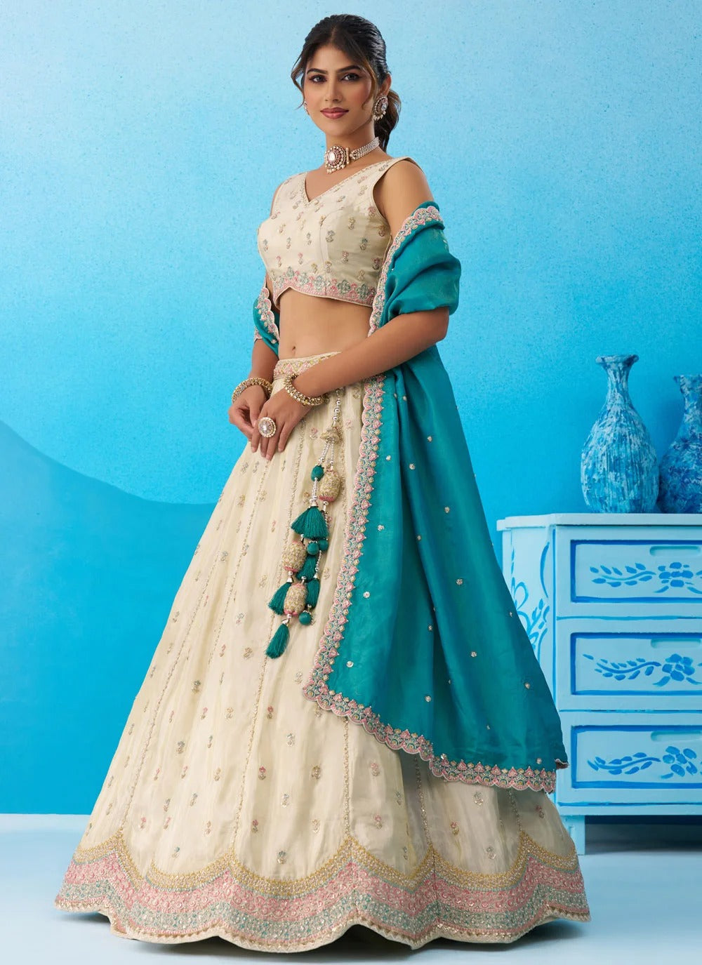 Cream wedding lehenga for women with rama tissue dupatta