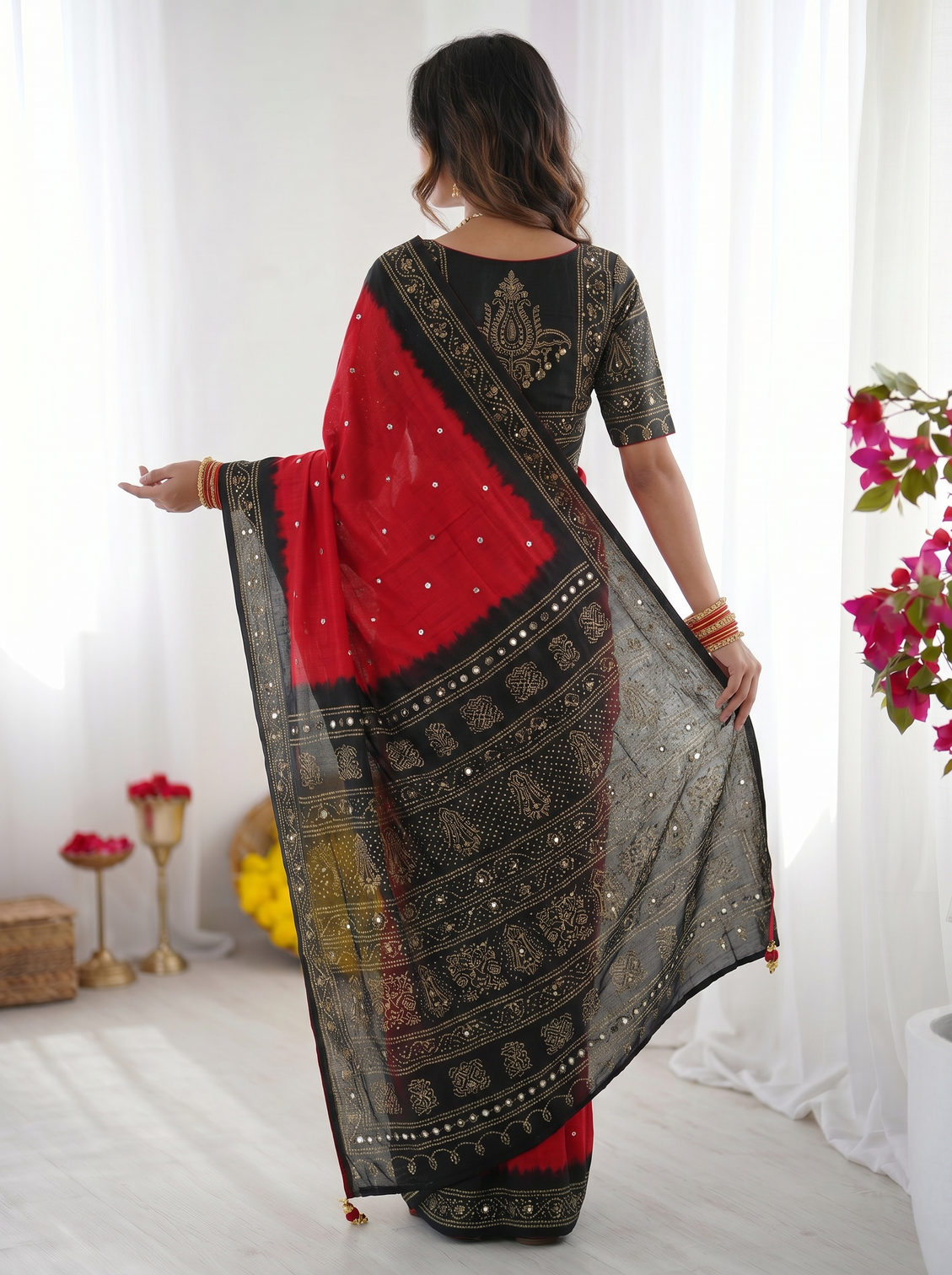 Crimson red black modal silk saree with traditional bandhani inspired motifs stone work heritage folk art pallu