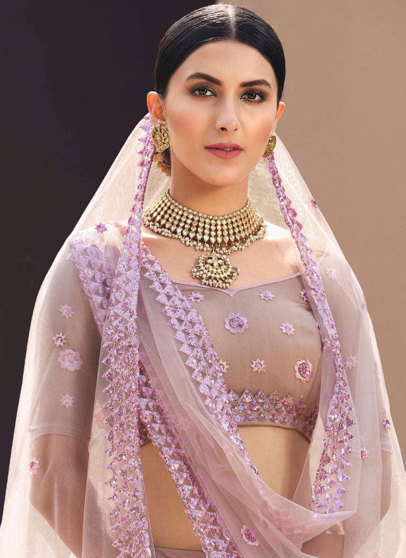 Dainty Lilac Color Soft Net Base With Sequins Work Lehenga Choli