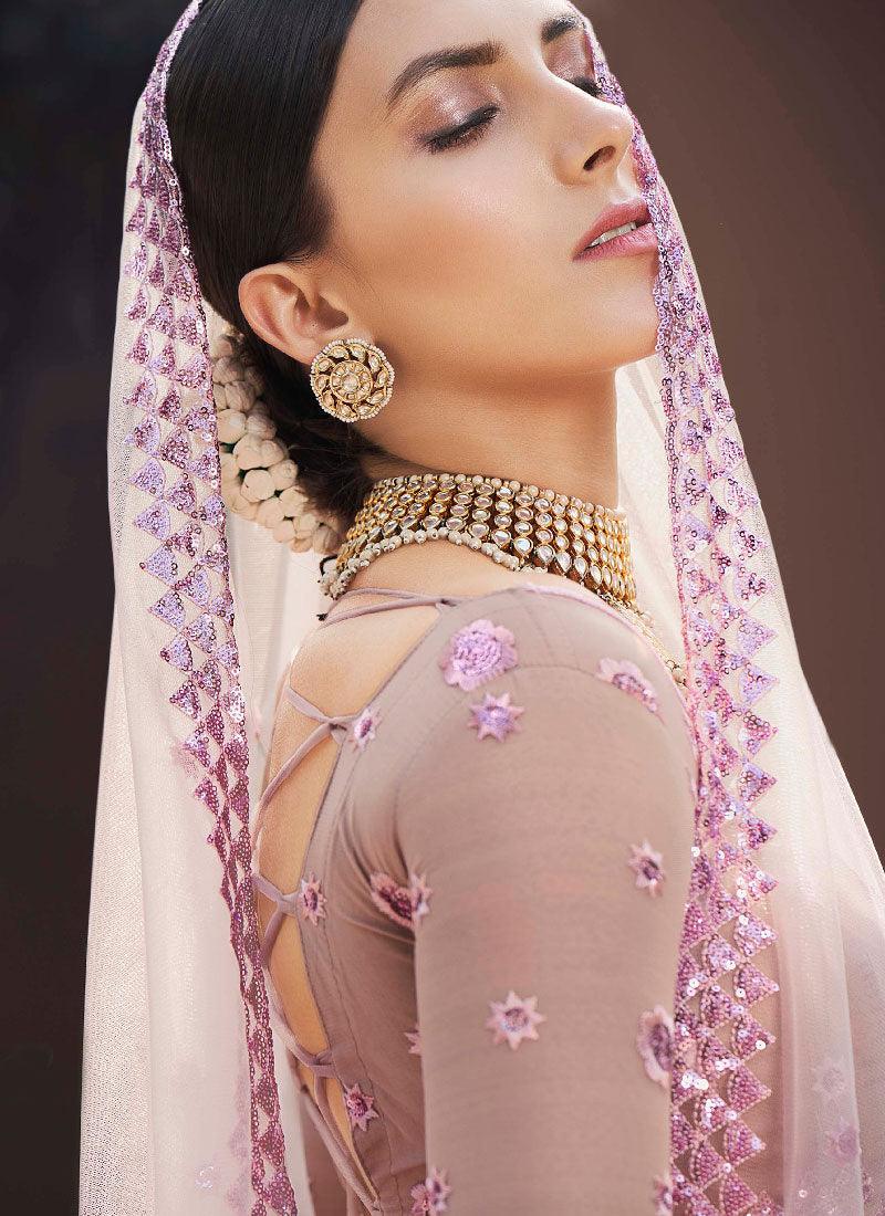 Dainty Lilac Color Soft Net Base With Sequins Work Lehenga Choli