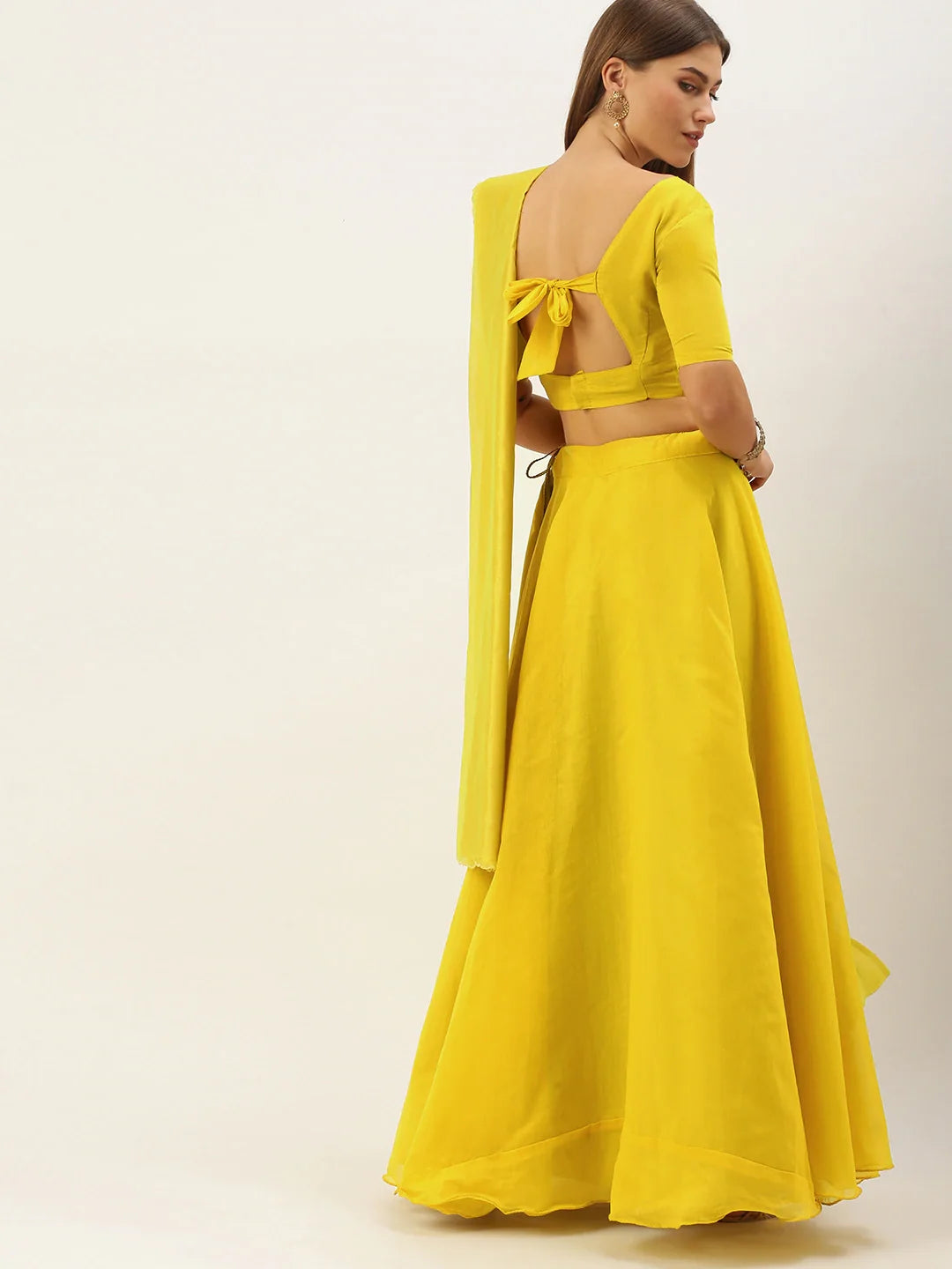 Yellow Silk Lehenga Choli with Flower attached