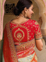 Delightful Grey And Orange Embroidered Work Pure Dola Silk Traditional Saree