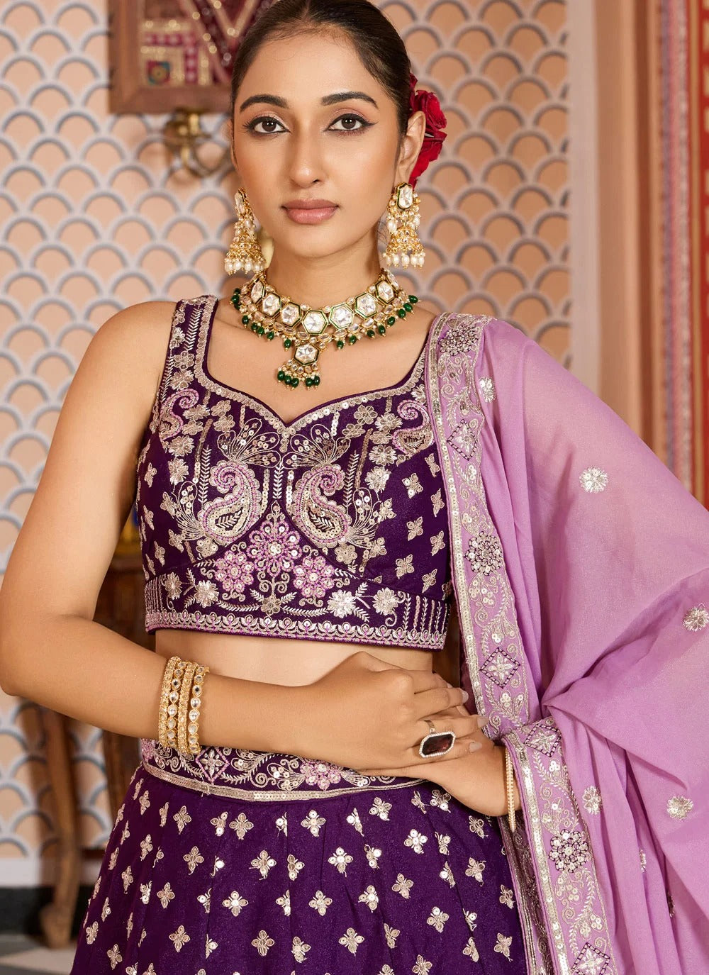Opulent burgundy engagement lehenga in tissue silk with zari sequins embroidery