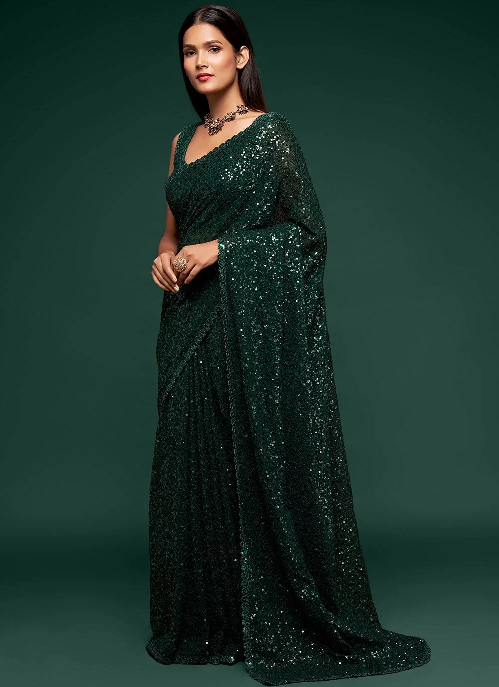 Designer georgette sequins saree in deep green
